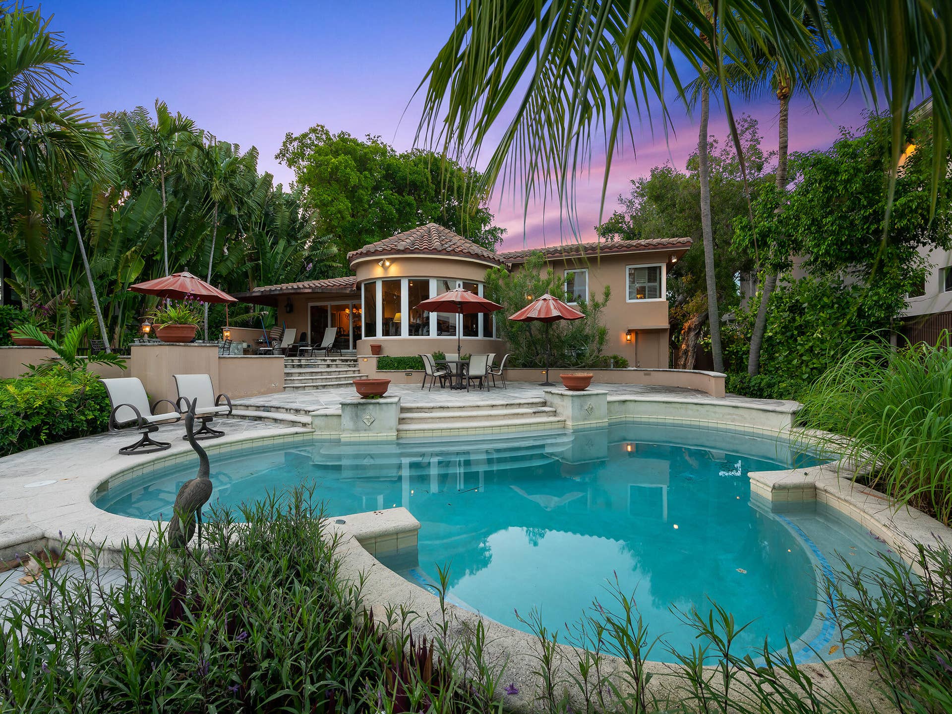 Pool has several seating areas