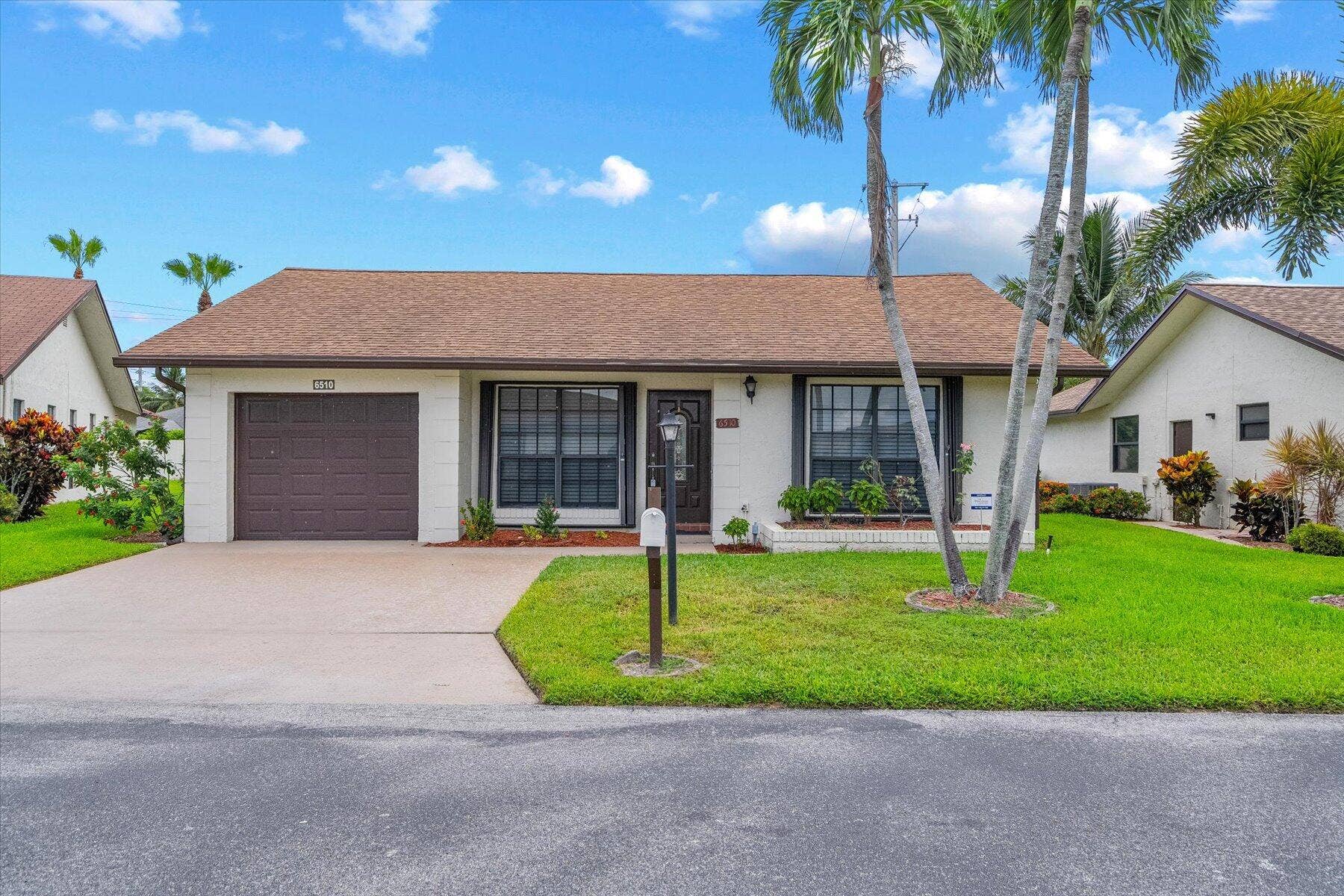 6510 OLIVEWOOD Circle, Greenacres, FL 33463 Front of the house