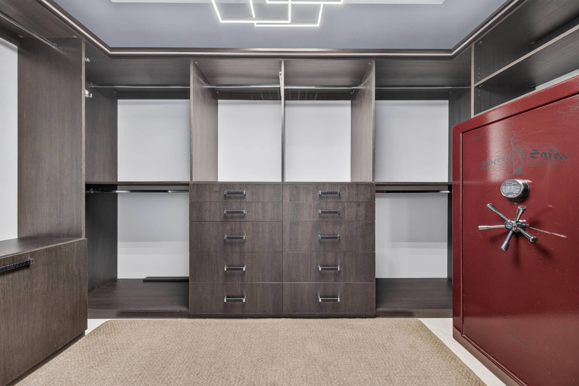 3900 Galt Ocean Drive, #2417, Fort Lauderdale, FL 33308 Custom-fitted primary walk-in closet with extensive built-in storage and an included full-size safe.