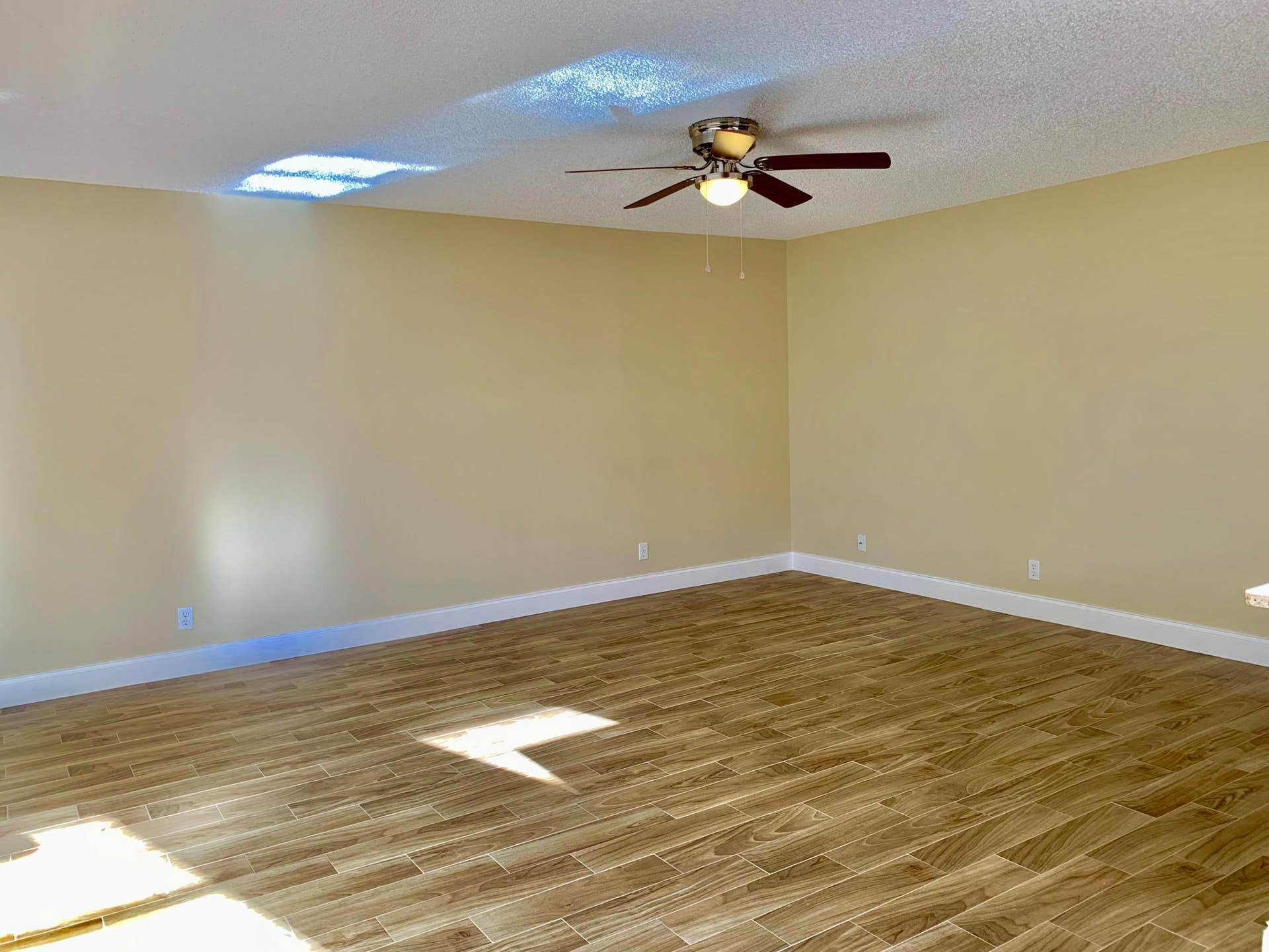 Porcelain Wood Plank Tile Floors Thru out.