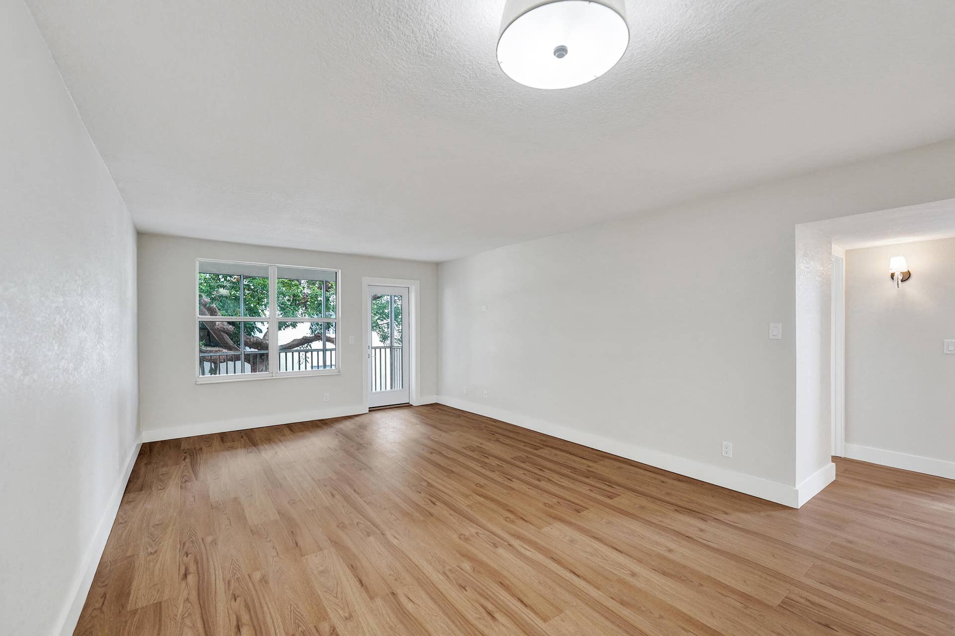 Living area offers views of courtyard
