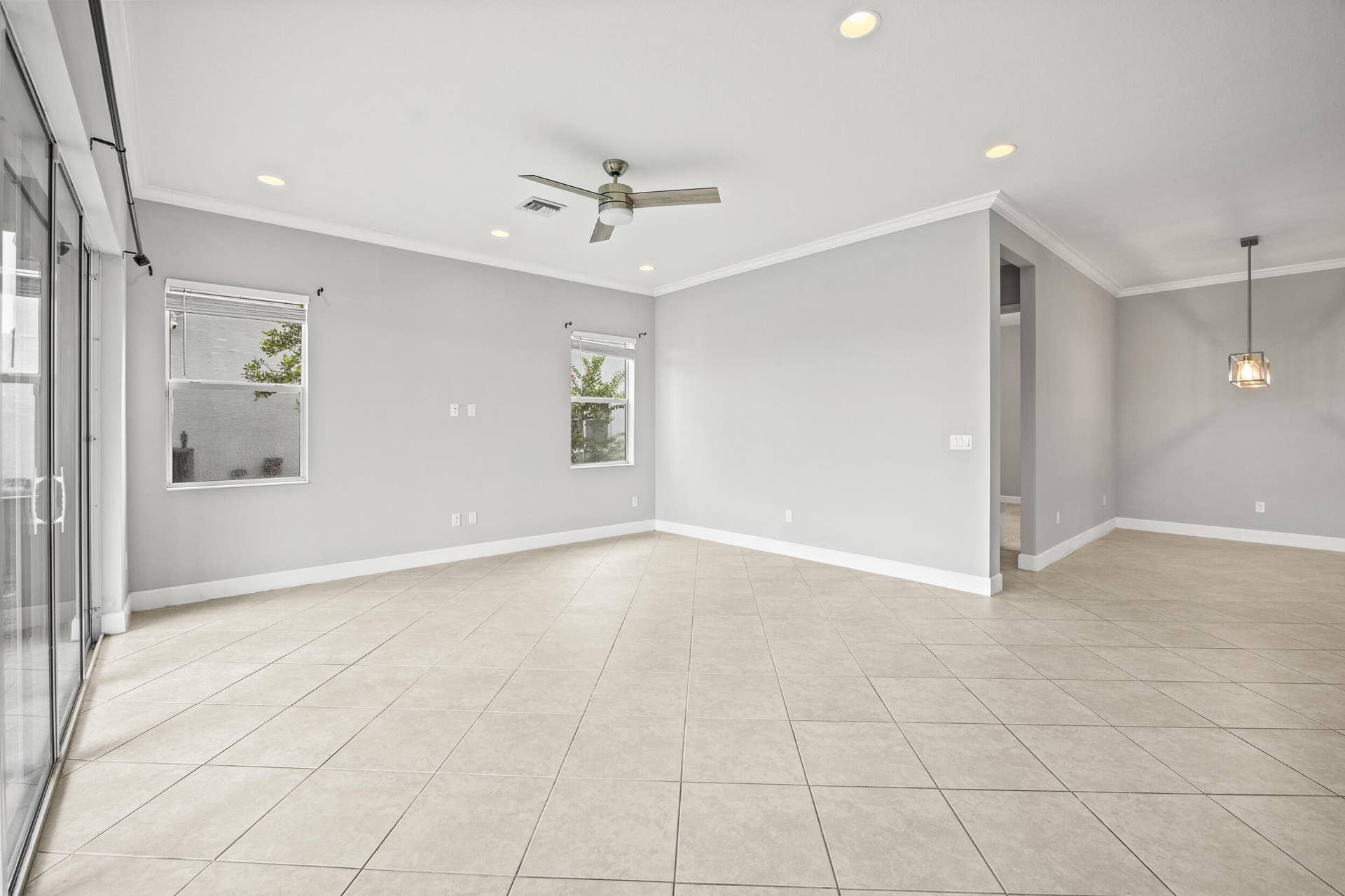 16007 Whippoorwill Circle, Westlake, Westlake, FL 33470 Expansive tile flooring, recessed lighting, ceiling fan, and crown molding