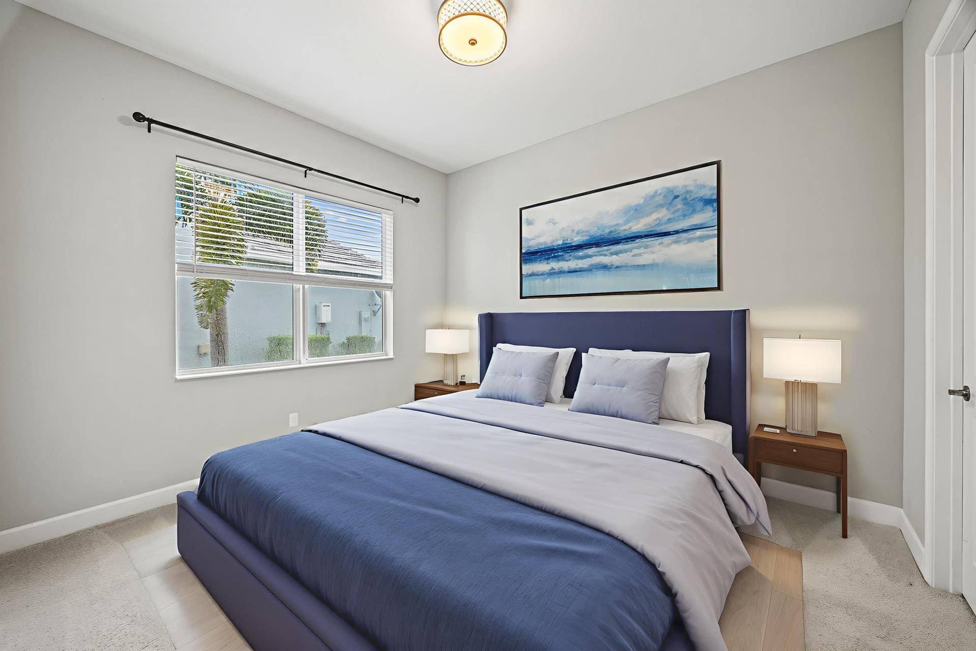 16007 Whippoorwill Circle, Westlake, Westlake, FL 33470 Recessed window with blinds, overhead drum light fixture, and paneled interior door