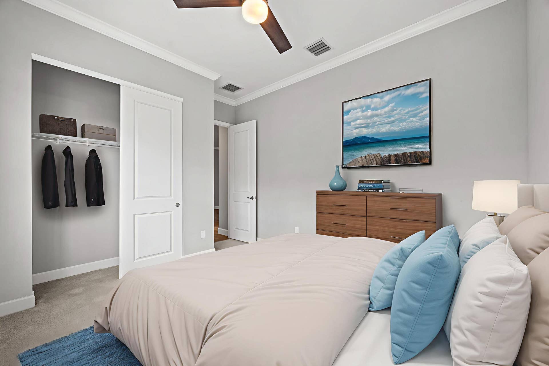 16007 Whippoorwill Circle, Westlake, Westlake, FL 33470 Recessed lighting, crown molding, and a ceiling fan enhance the room