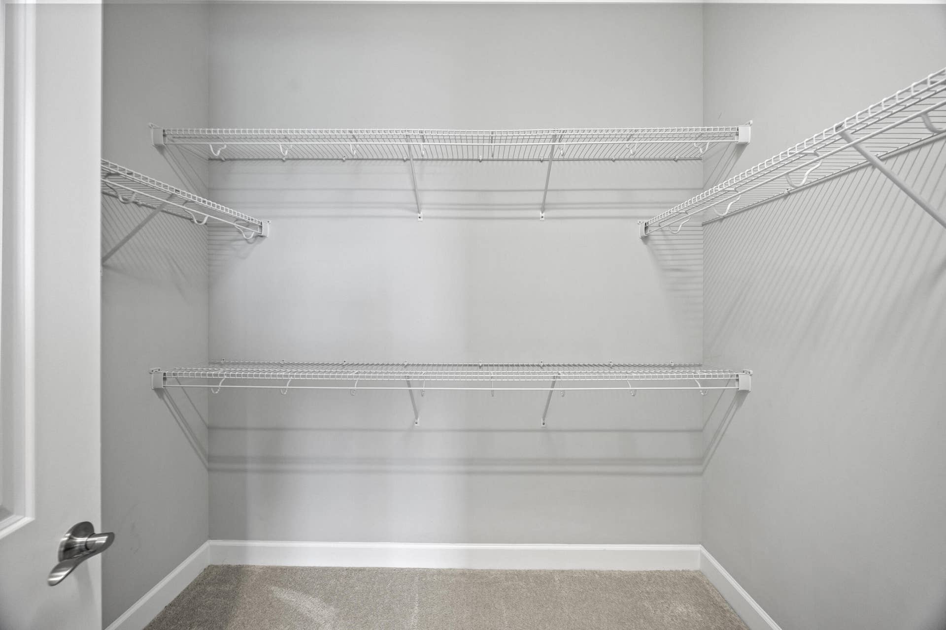 16007 Whippoorwill Circle, Westlake, Westlake, FL 33470 Built-in wire shelving, plush carpet, and white trim molding