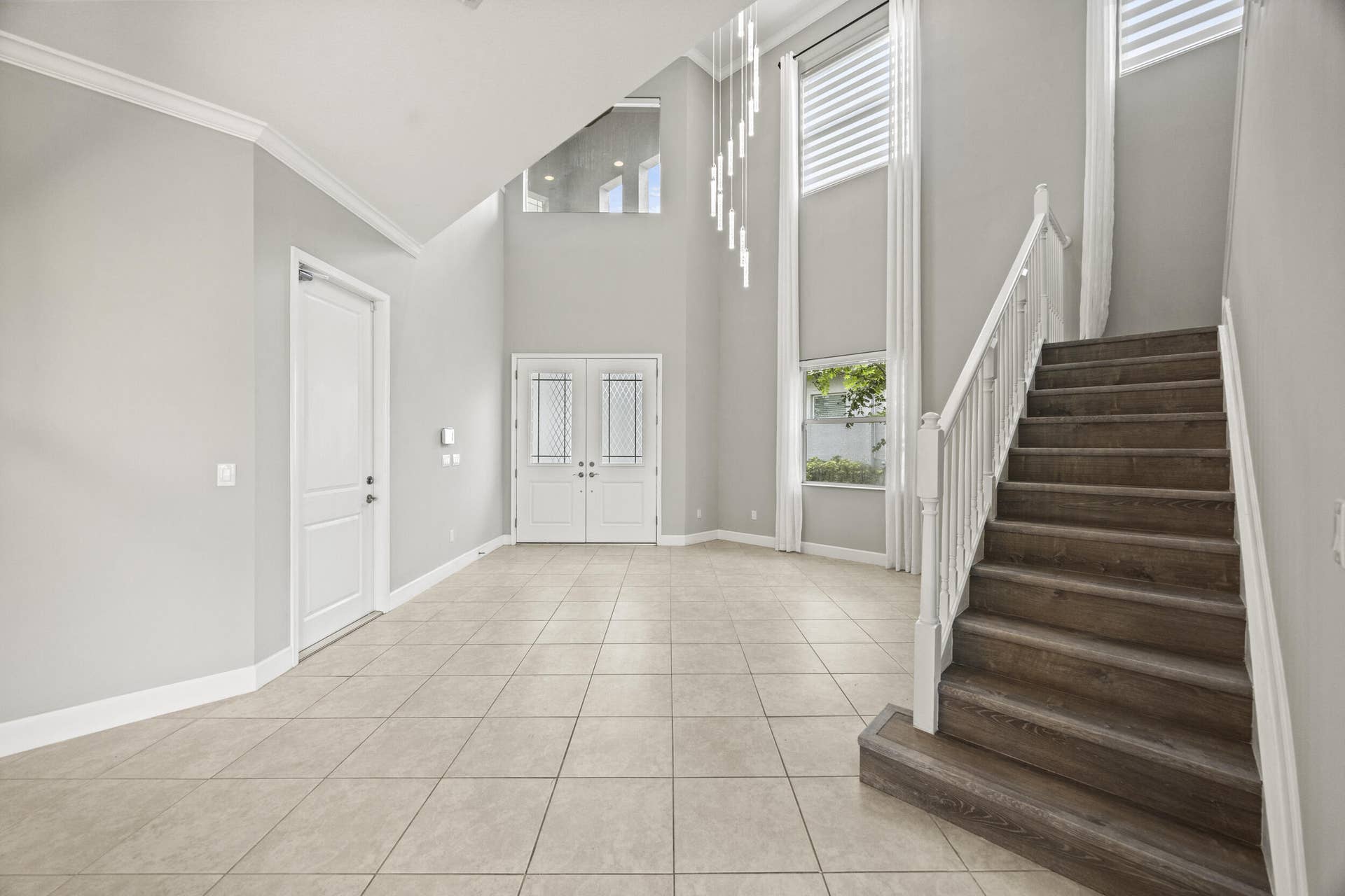16007 Whippoorwill Circle, Westlake, Westlake, FL 33470 Grand foyer with ceramic tile flooring and soaring ceiling
