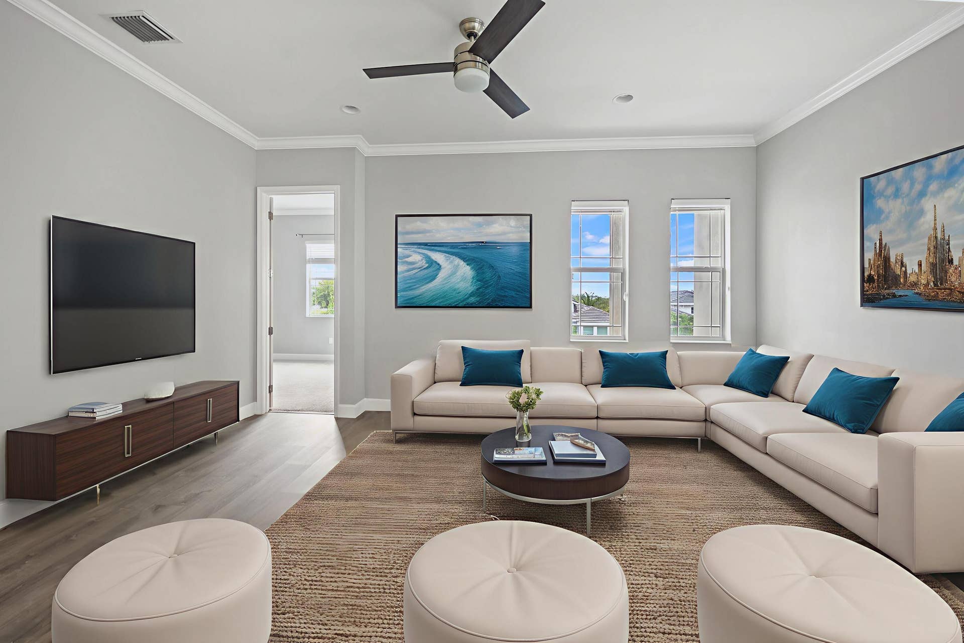 16007 Whippoorwill Circle, Westlake, Westlake, FL 33470 Spacious living area featuring wood-finish flooring, a ceiling fan, and crown molding
