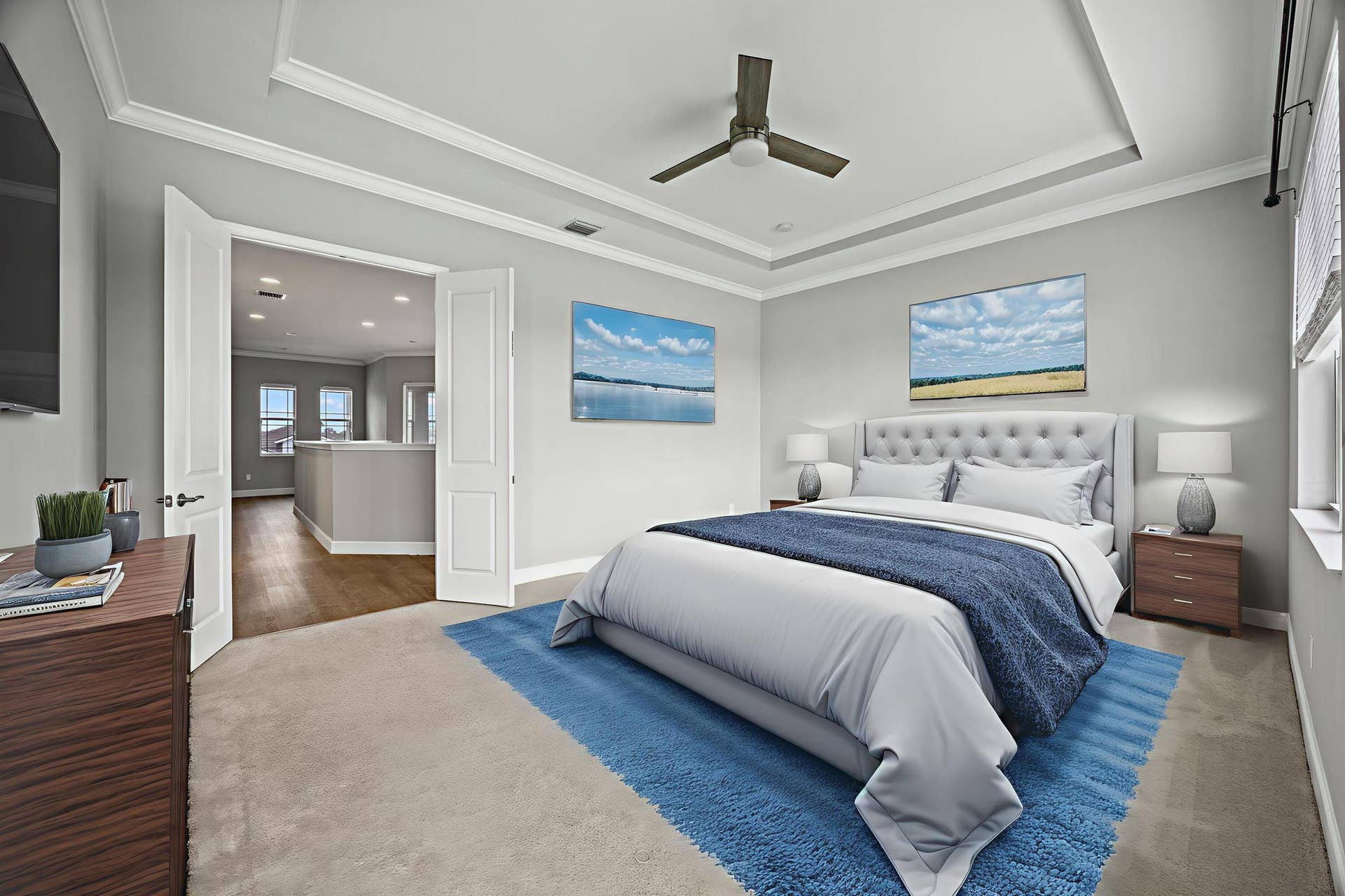 16007 Whippoorwill Circle, Westlake, Westlake, FL 33470 Tray ceiling with crown molding, plush carpet, recessed lighting, ceiling fan, and double doors