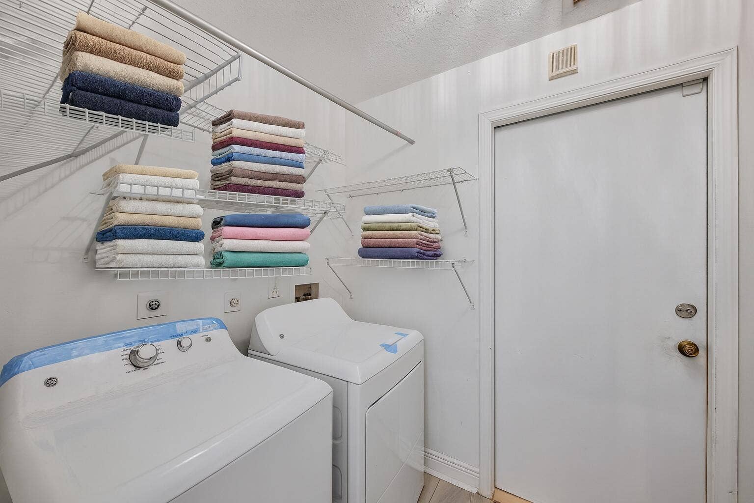 Organized Laundry Room with Appliances