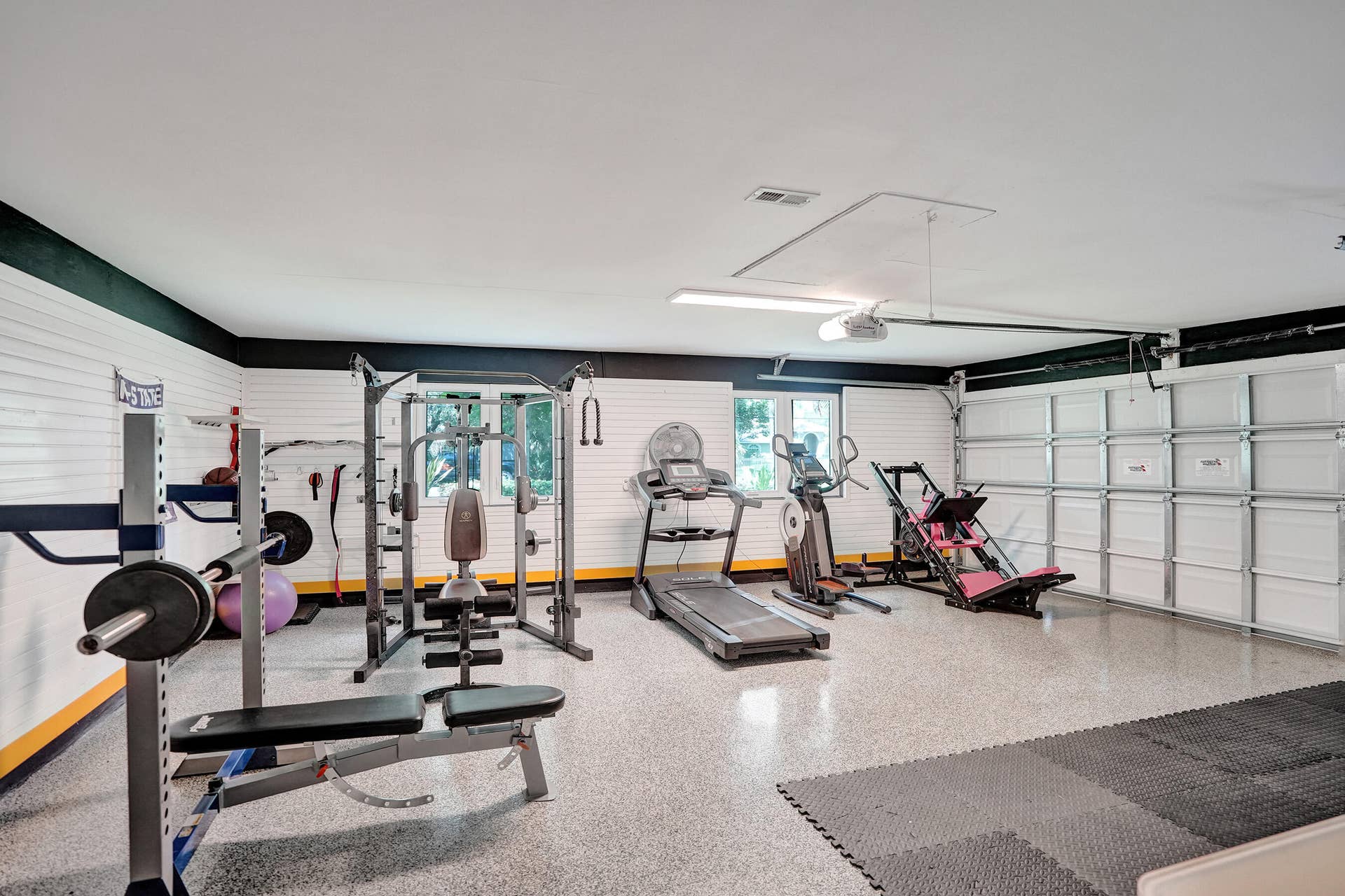 6146 NW 66TH Avenue, Parkland, FL 33067 Epoxy garage with wall organization system