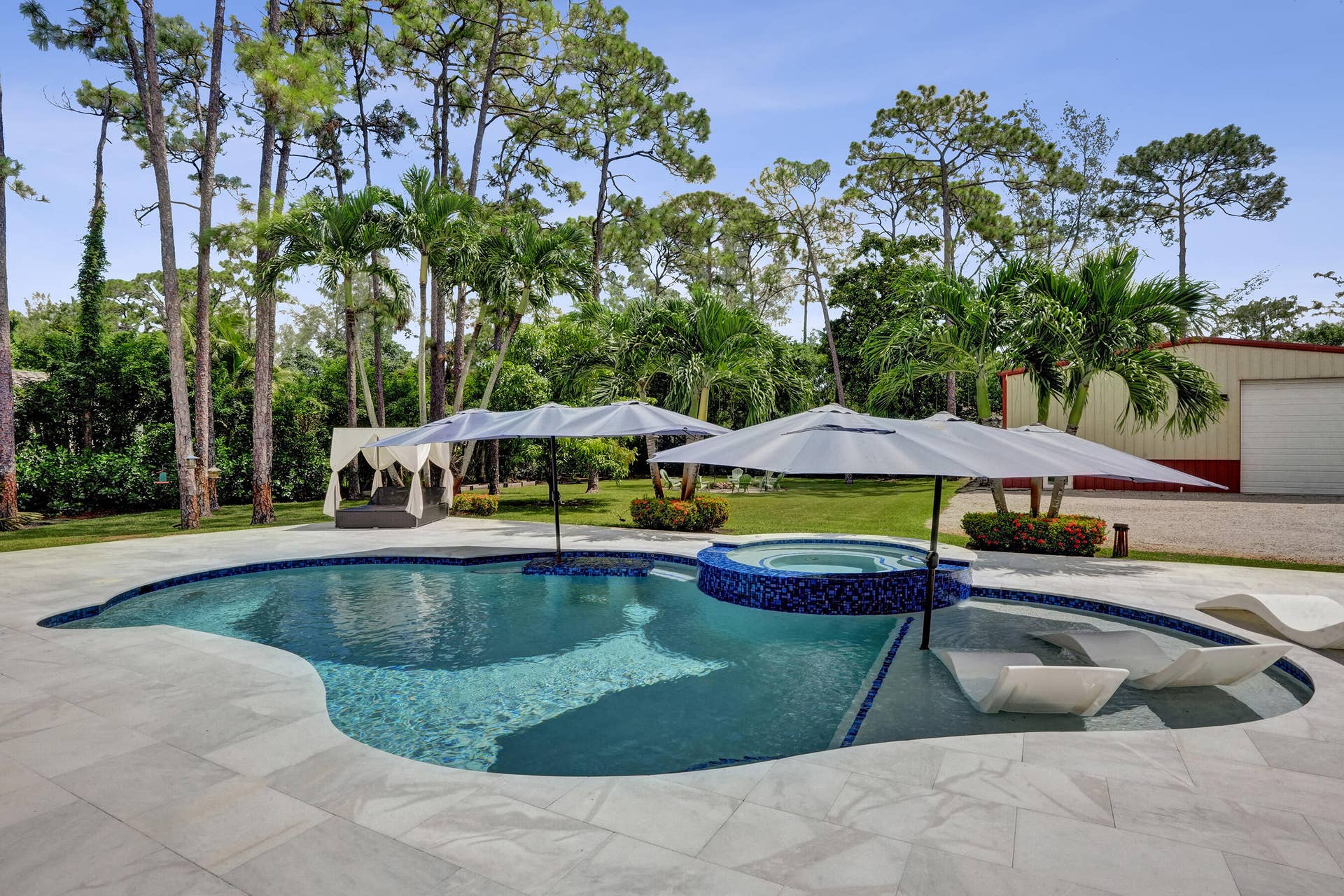 6146 NW 66TH Avenue, Parkland, FL 33067 Resort living: Newly resurfaced pool with marble surround with baja shelf