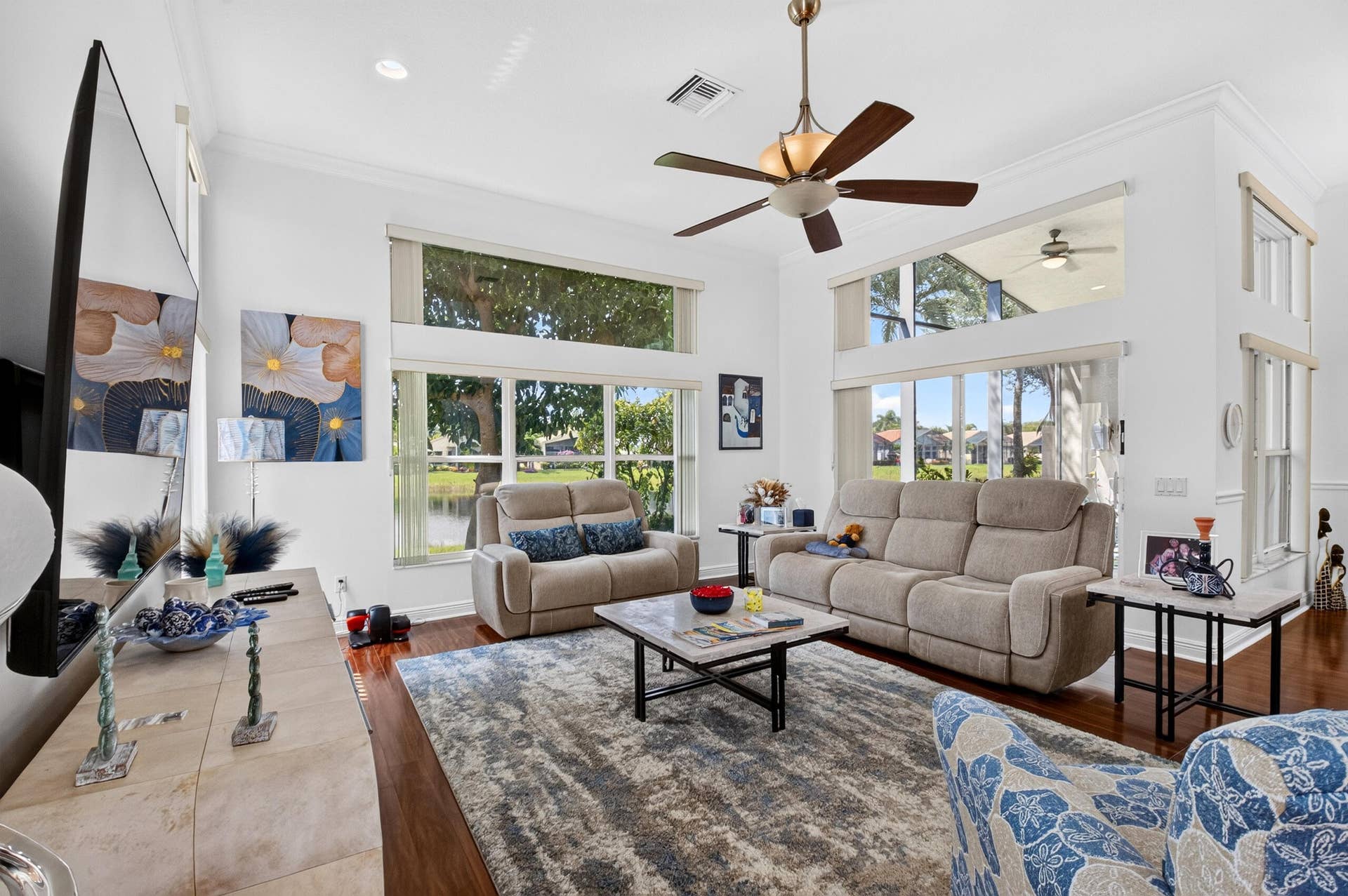 6600 Capistrano Beach Trail, Delray Beach, FL 33446 The Family Room flows effortlessly to the screened lanai
