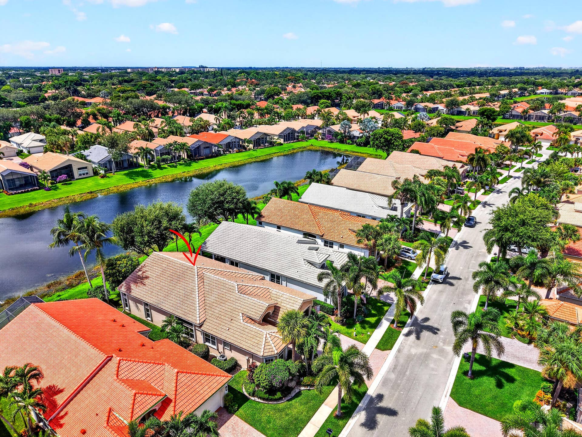 6600 Capistrano Beach Trail, Delray Beach, FL 33446 This beautiful tree-lined setting with the lake just beyond, captures the warmth, beauty of this established community