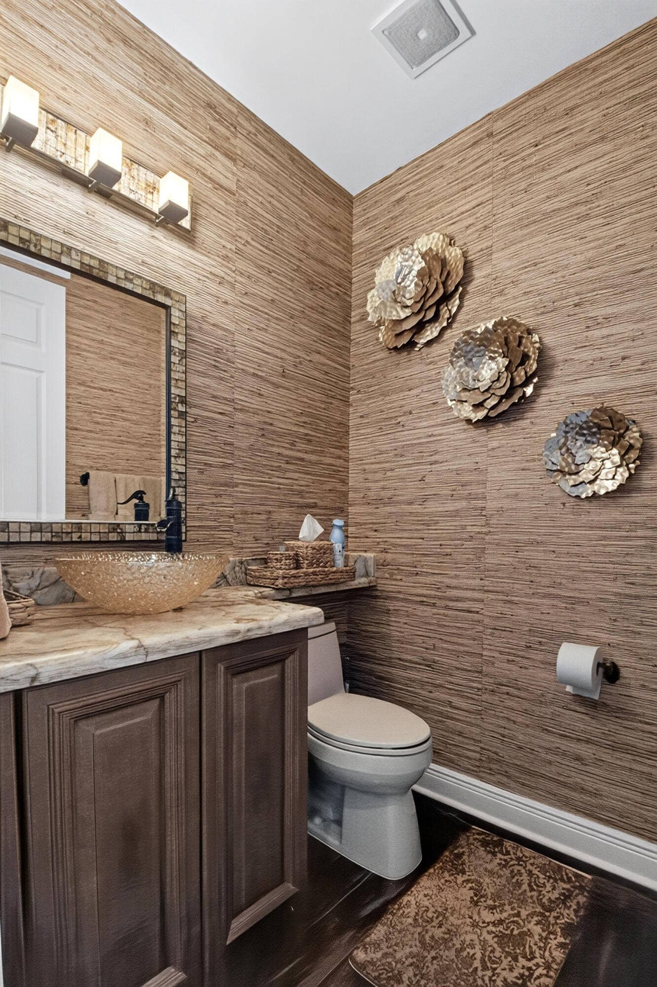 6600 Capistrano Beach Trail, Delray Beach, FL 33446 Luxurious Grasscloth Walls & an Onyx Counter which is really beautiful. Custom Mirror.