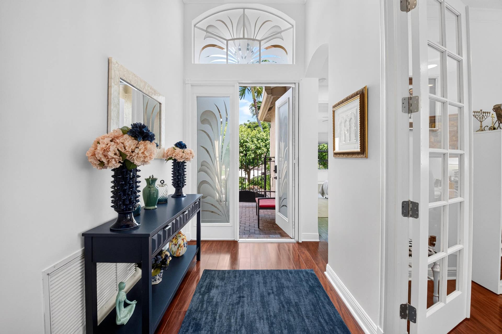 6600 Capistrano Beach Trail, Delray Beach, FL 33446 Matching transom windows creates a beautiful first impression