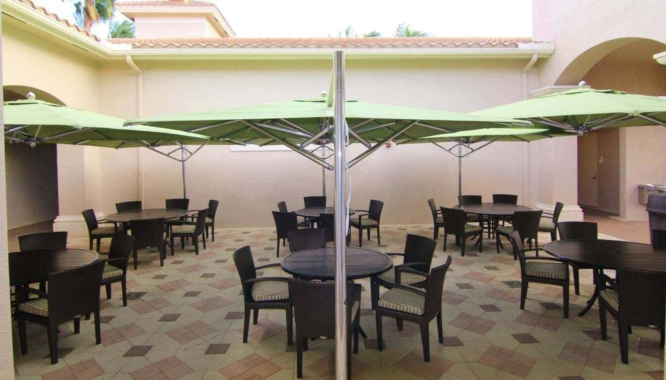 6600 Capistrano Beach Trail, Delray Beach, FL 33446 Dining under the umbrellas