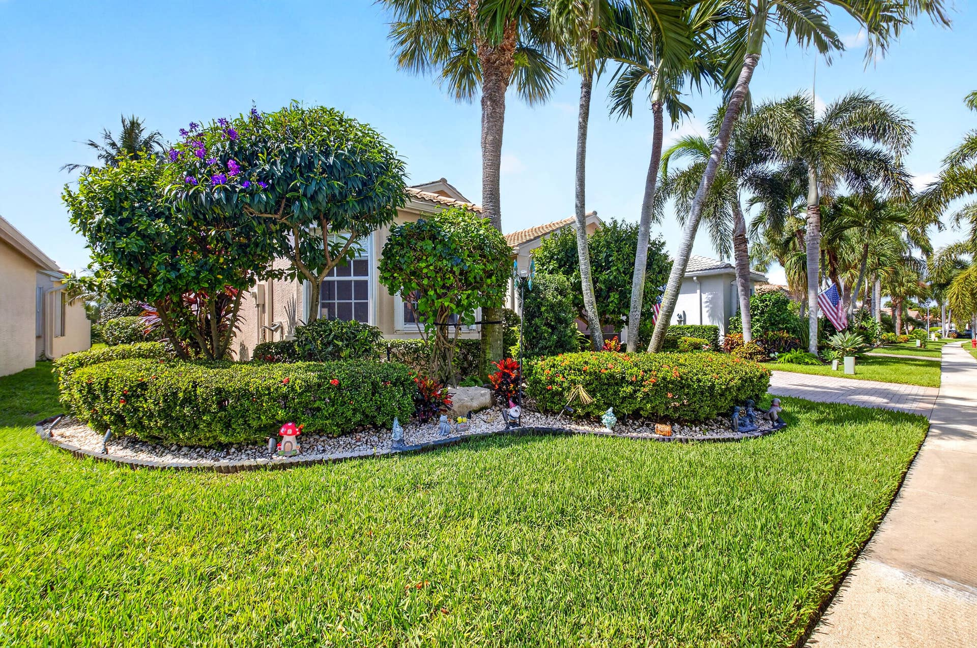 6600 Capistrano Beach Trail, Delray Beach, FL 33446 Lush Garden in the Front, Side and Back of this lovely home.