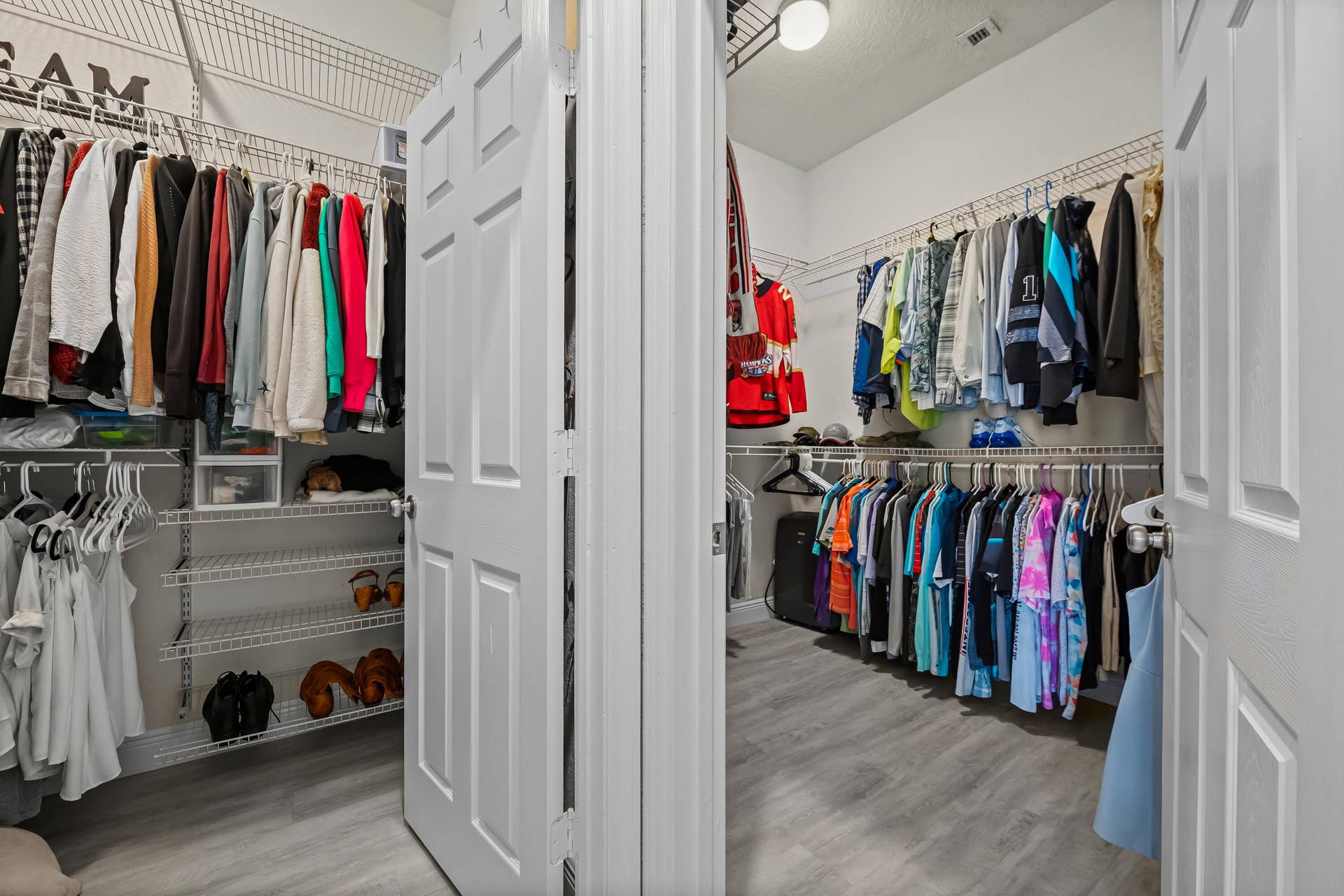 Double walk-in closets in primary bedroom with separate linen closet (not shown)