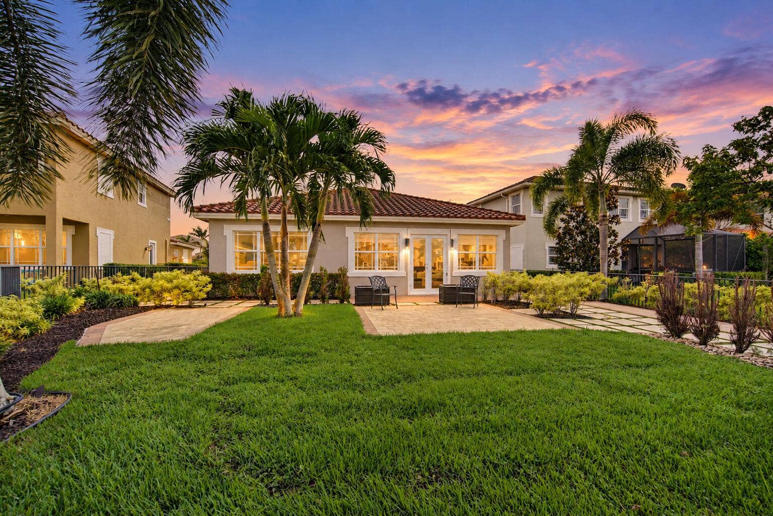 8561 LAKESIDE Bend, Parkland, FL 33076 Twilight Tropical Backyard Retreat