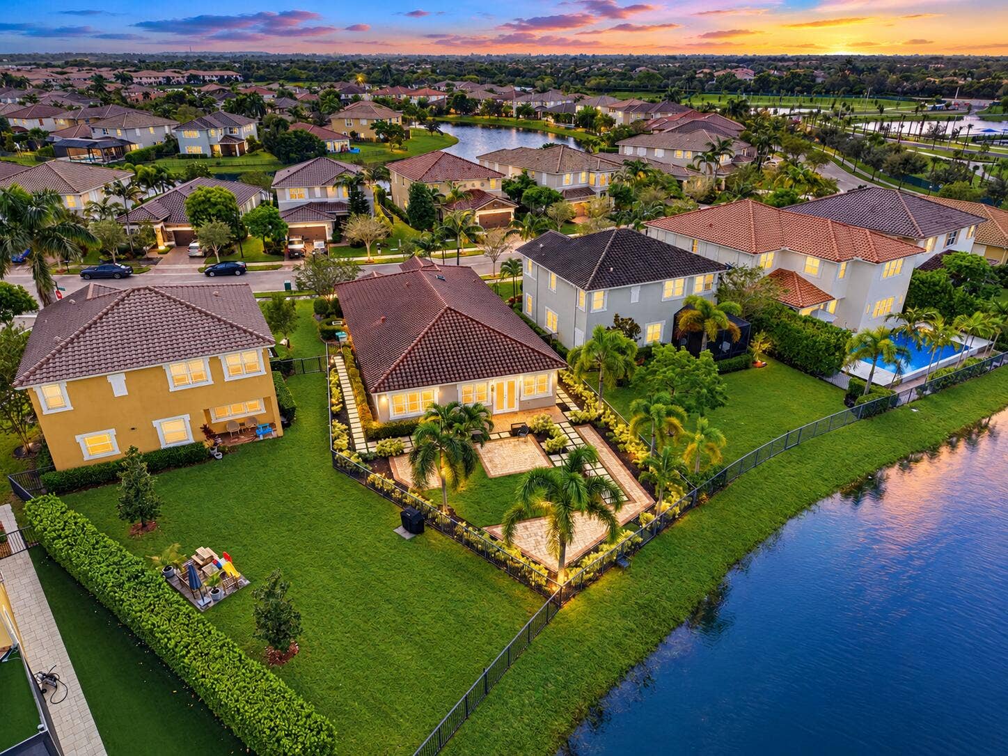 8561 LAKESIDE Bend, Parkland, FL 33076 Twilight Lakeside Suburban Retreat