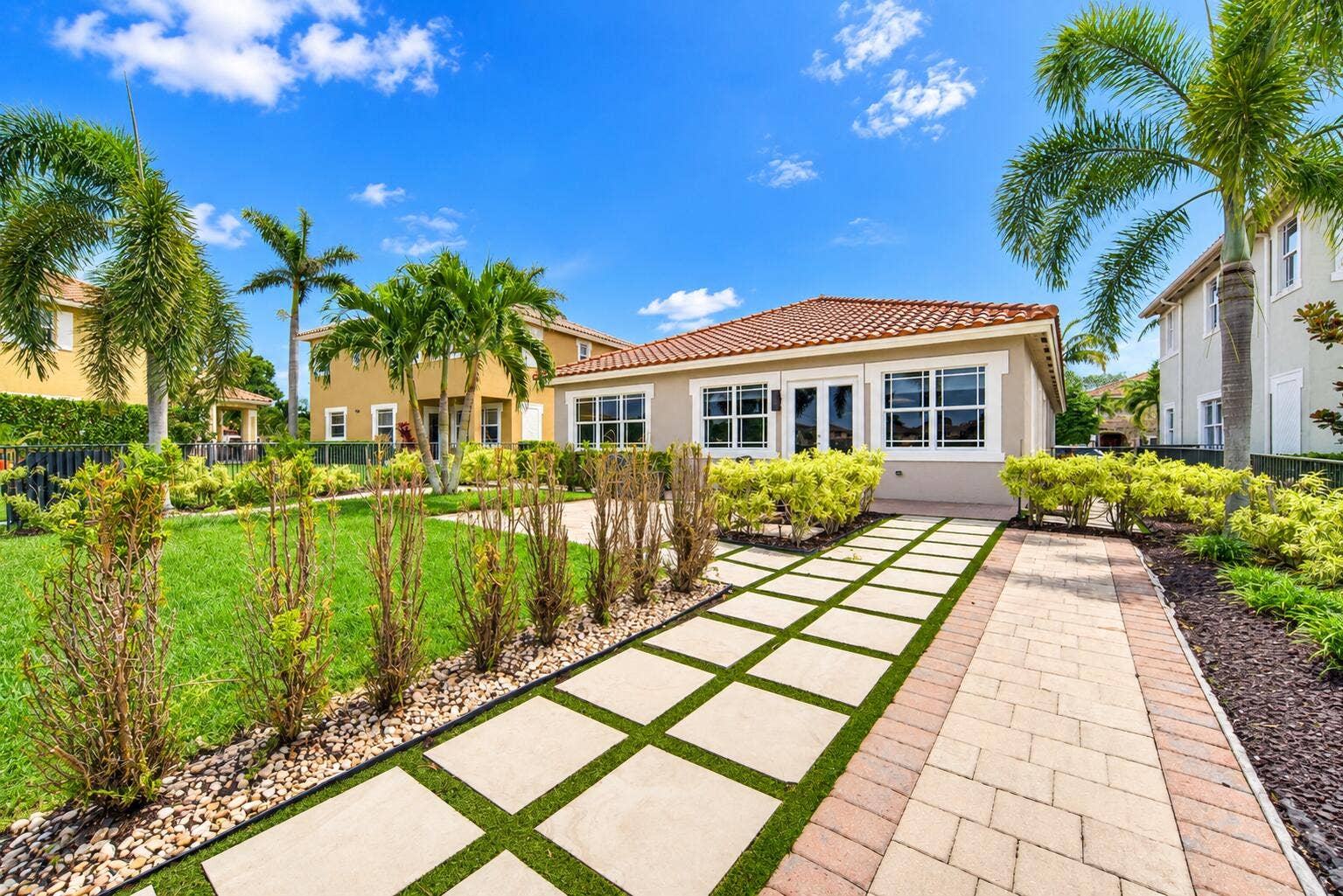 8561 LAKESIDE Bend, Parkland, FL 33076 Tropical Paver Path to Stucco Home