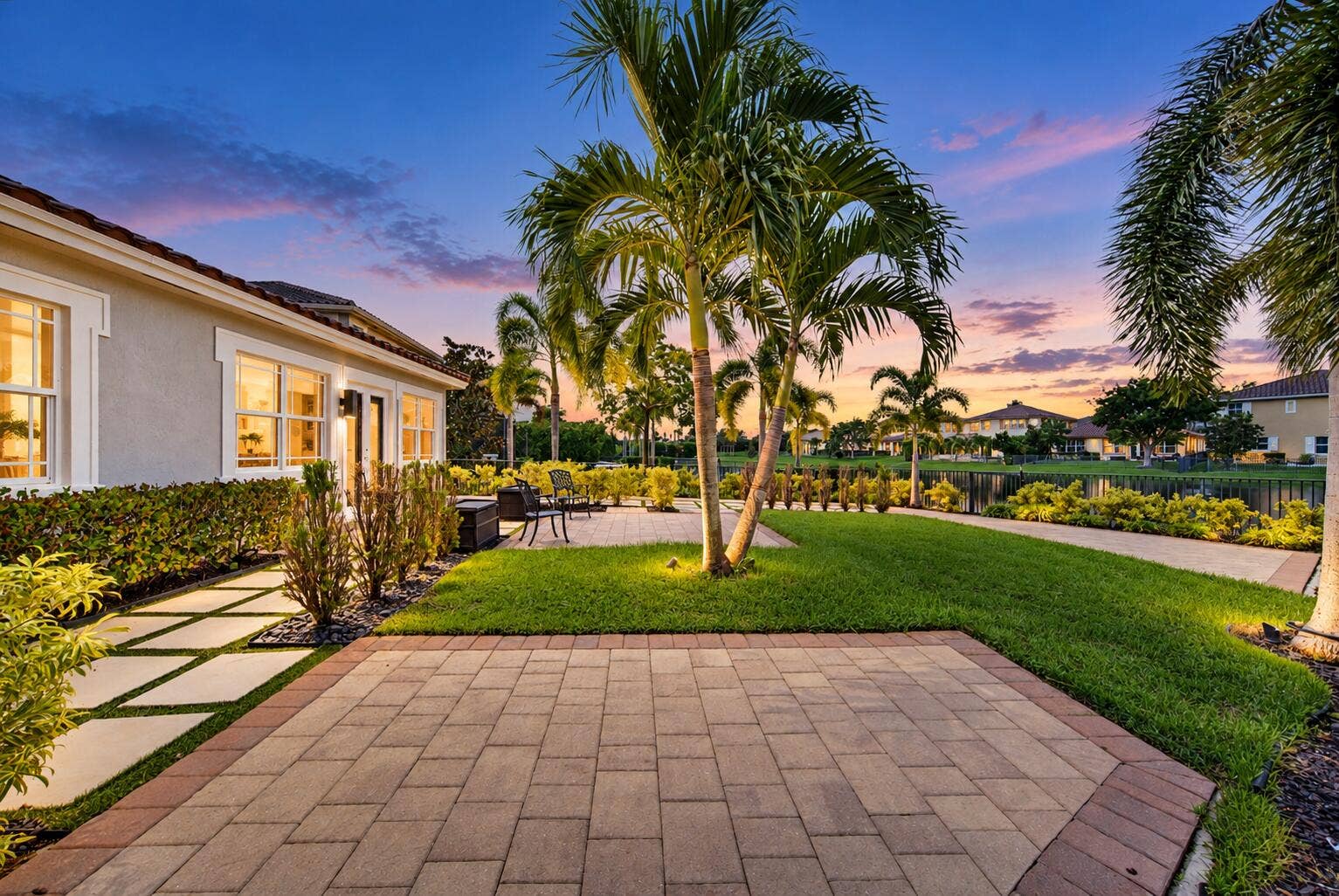 8561 LAKESIDE Bend, Parkland, FL 33076 Twilight Patio by the Tropical Lake