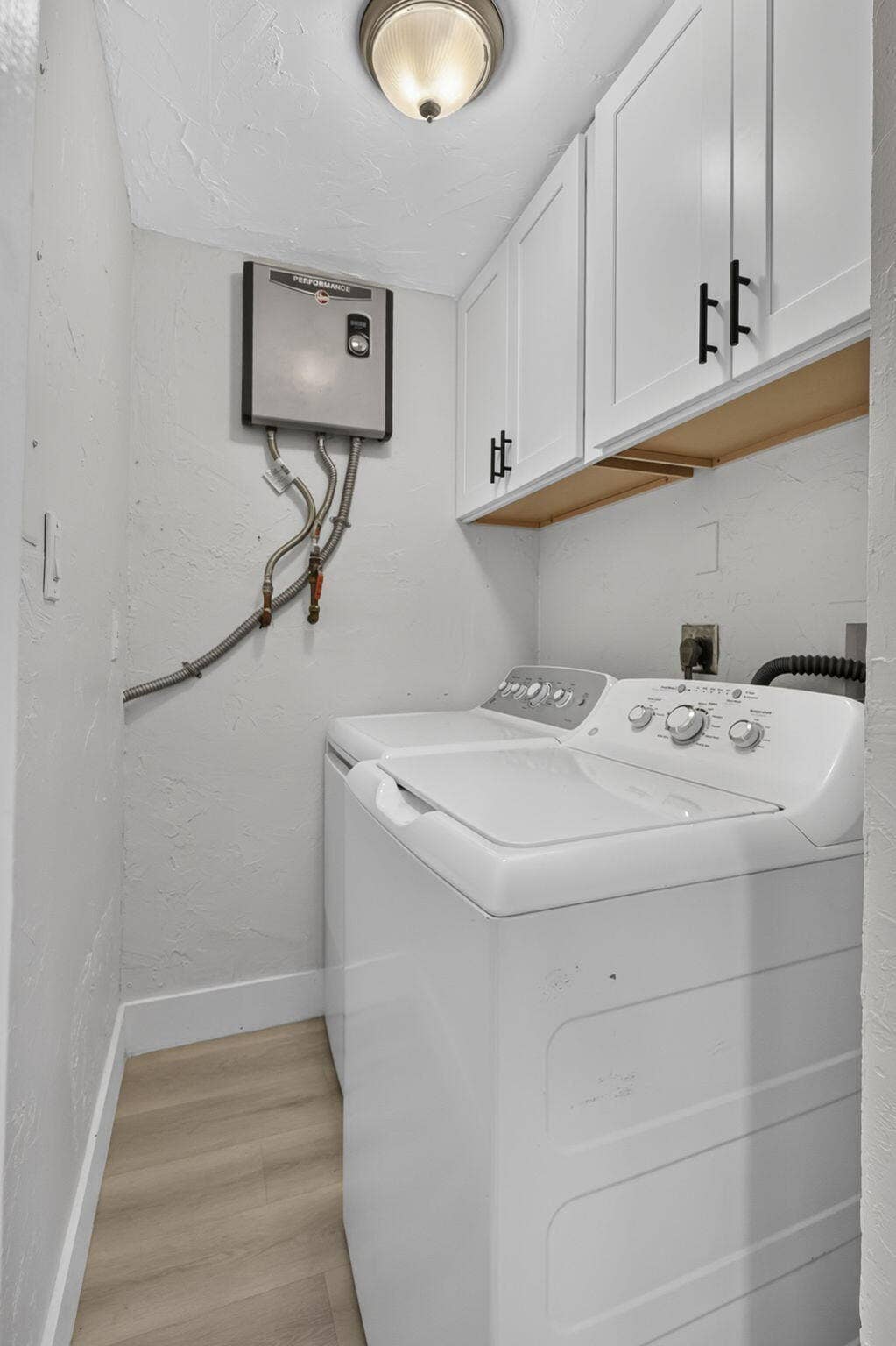 840 Bradley Street, West Palm Beach, FL 33405 Laundry Area w/ cabinets