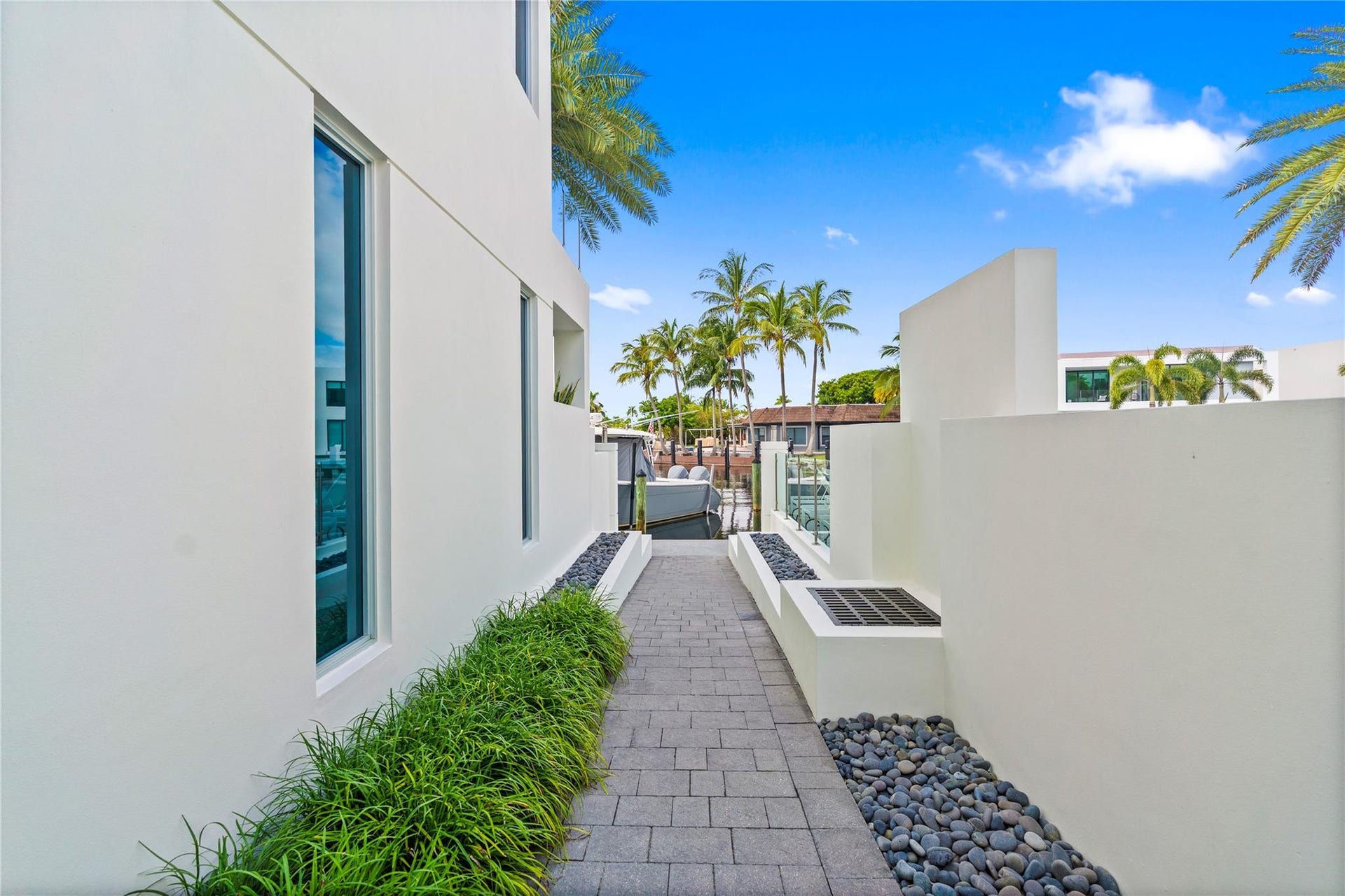 221 Shore Court, Lauderdale By The Sea, FL 33308 A remarkable luxury townhome rental that redefines upscale living in the heart of Lauderdale By The Sea. This beautifully designed 3,027 sq. ft residence features 4 spacious beds & 4.5 baths, making it perfect for families or those who love to entertain.The home also offers an outdoor kitchen and BBQ area, along with a private plunge pool that invites relaxation and fun. For boating enthusiasts, a boat slip is also available for rent. Easy access to a plethora of amenities, beach, dining, & entertainment.