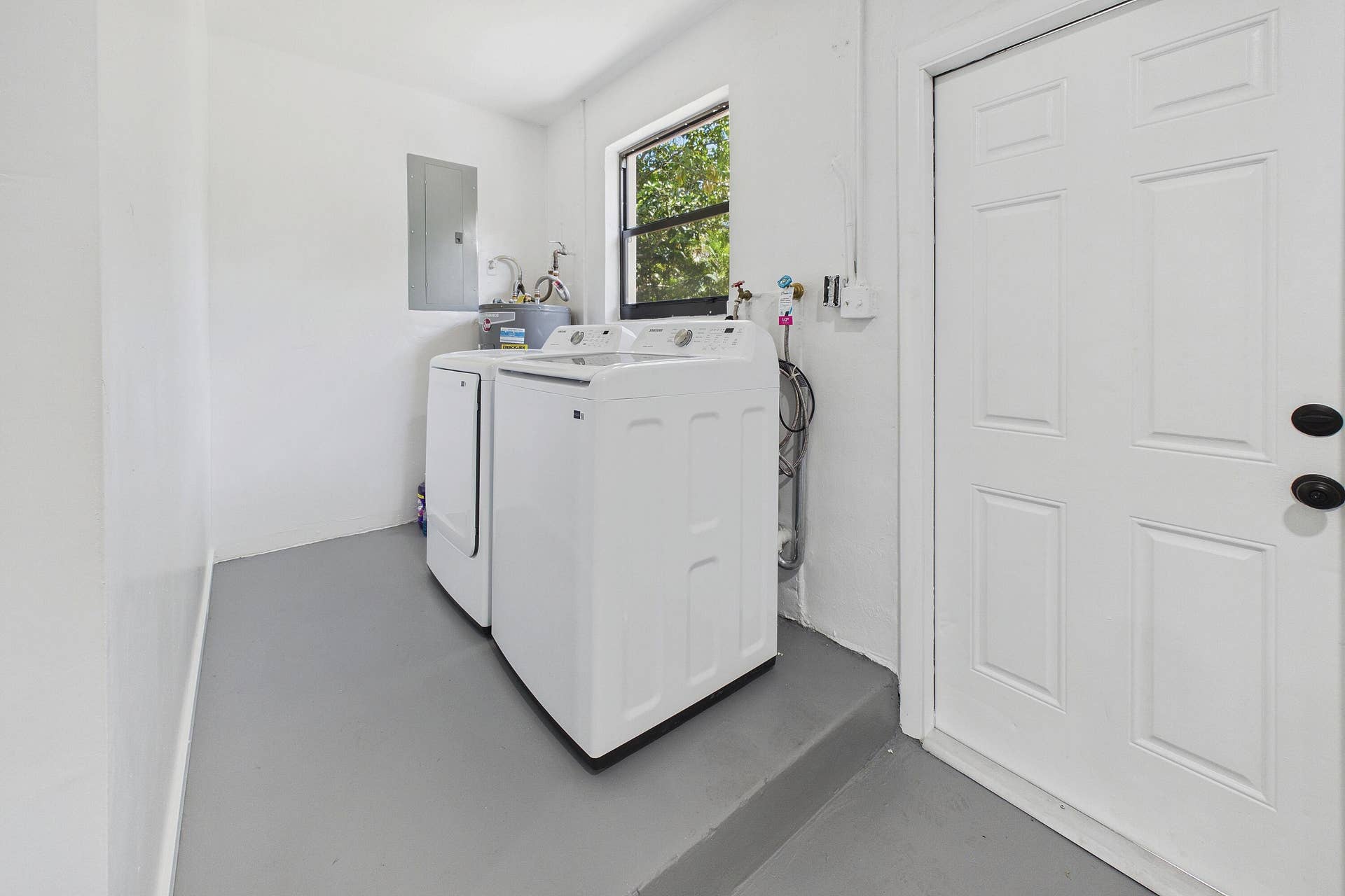 Laundry room in garage