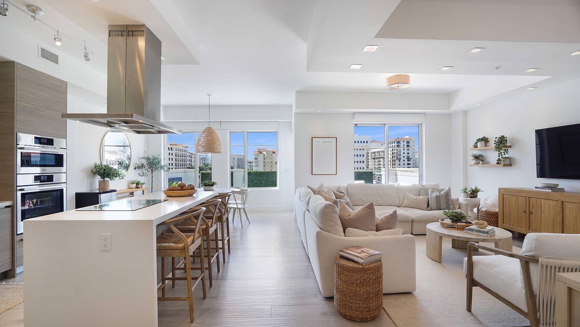 155 E Boca Raton Road, #601, Boca Raton, FL 33432 An open composition of living, dining and kitchen spaces, framed by natural light and the terrace beyond.