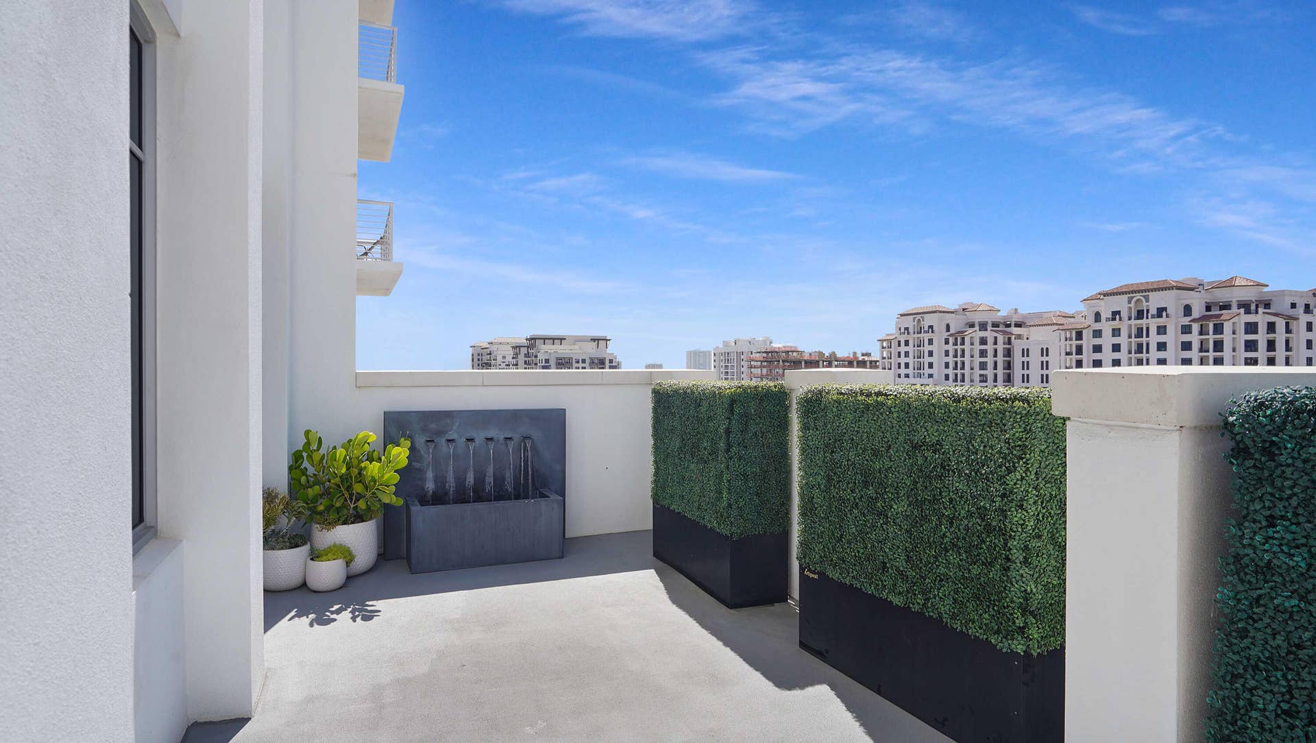 155 E Boca Raton Road, #601, Boca Raton, FL 33432 The south-facing terrace extends the architecture outdoors, creating a distinct open-air living space