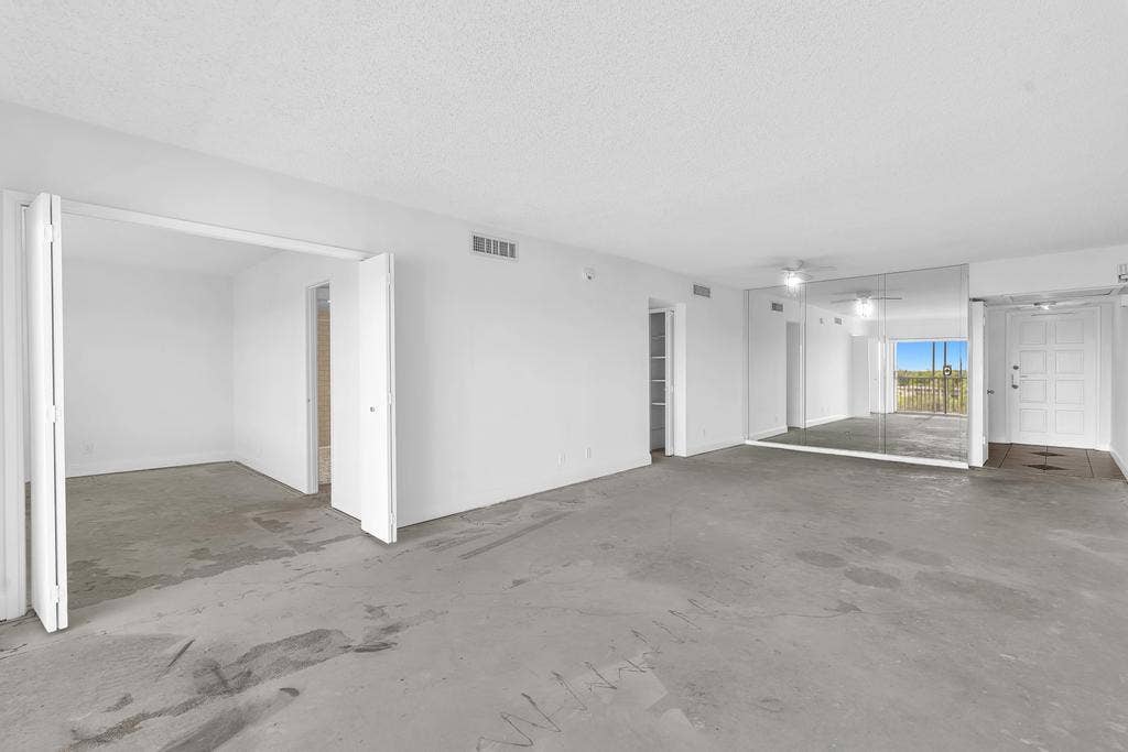 2950 N Palm Aire Drive, #607, Pompano Beach, FL 33069 Living Dining Combo & Entryway to the Primary Bedroom