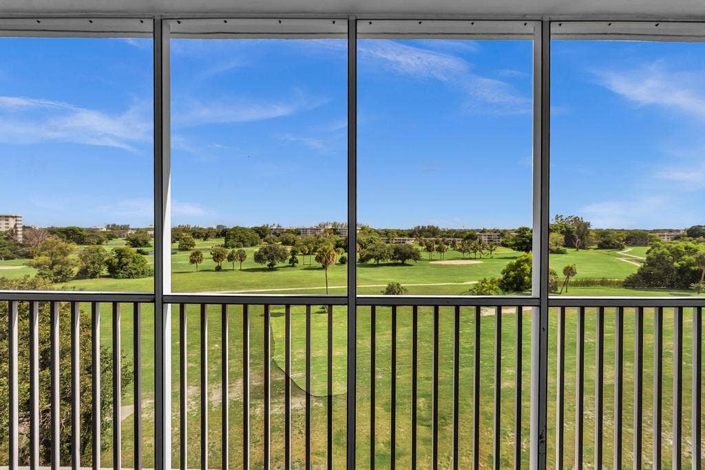 2950 N Palm Aire Drive, #607, Pompano Beach, FL 33069 Screened in patio overlooking the golf course