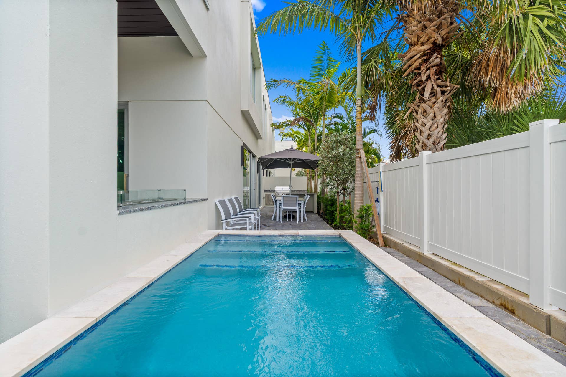 221 Shore Court, Lauderdale By The Sea, FL 33308 Private Plunge Pool - A remarkable luxury townhome rental that redefines upscale living in the heart of Lauderdale By The Sea. This beautifully designed 3,027 sq. ft residence features 4 spacious beds & 4.5 baths, making it perfect for families or those who love to entertain.The home also offers an outdoor kitchen and BBQ area, along with a private plunge pool that invites relaxation and fun. For boating enthusiasts, a boat slip is also available for rent. Easy access to a plethora of amenities, beach, dining, & entertainment.