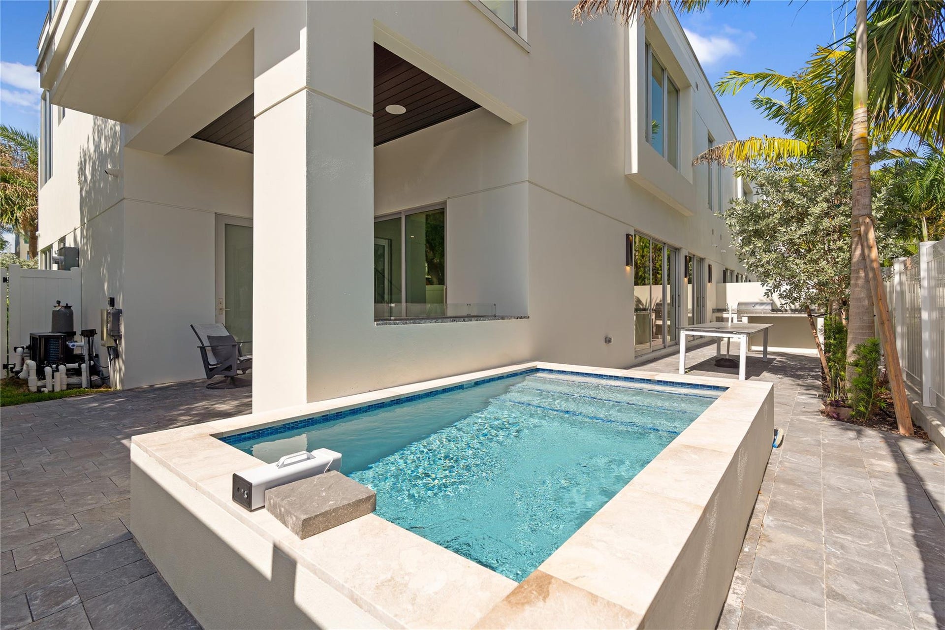 221 Shore Court, Lauderdale By The Sea, FL 33308 Patio Featuring Private Plunge Pool, Gas Fireplace, Outdoor Kitchen, and more!