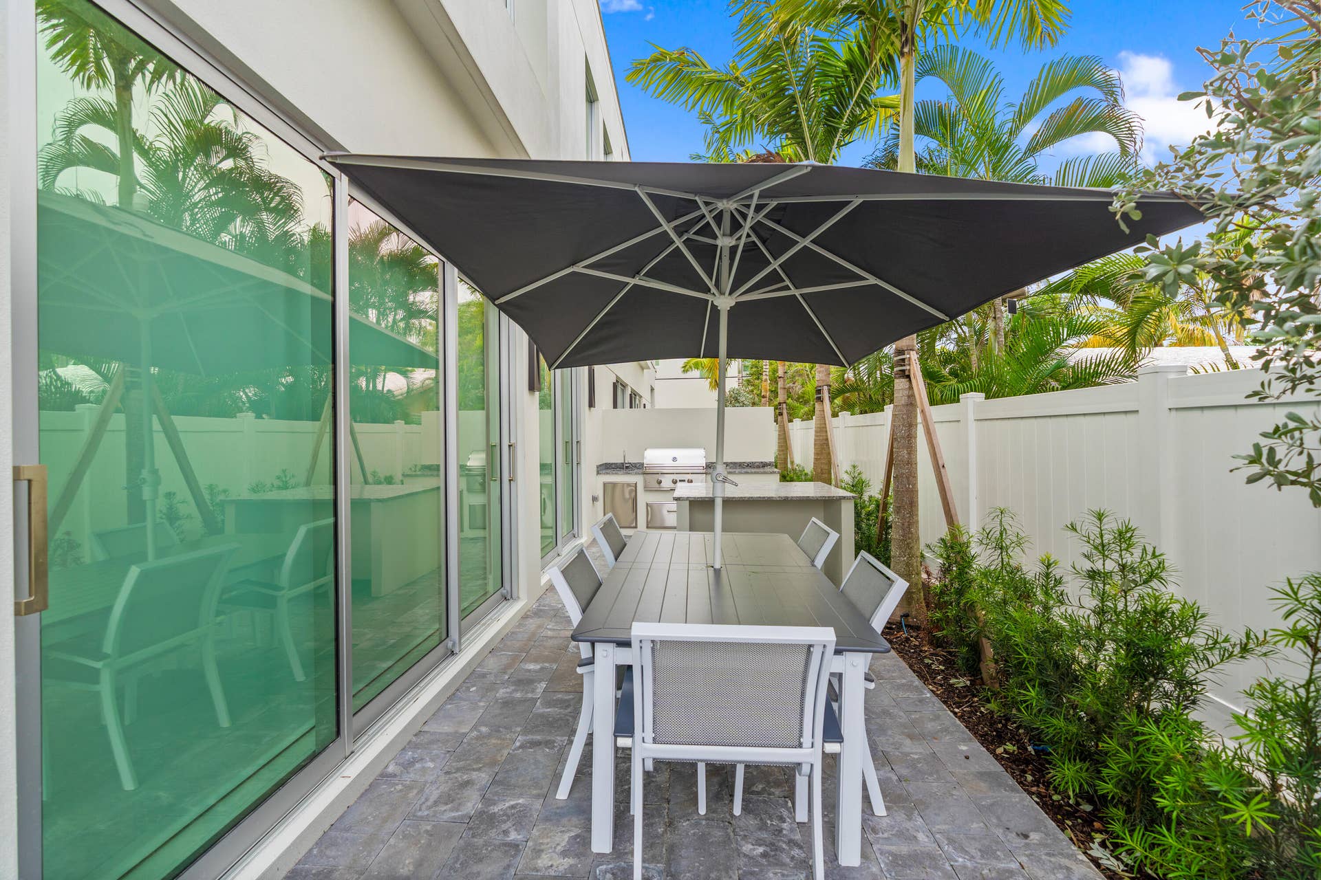 221 Shore Court, Lauderdale By The Sea, FL 33308 221 Shore Ct Patio Area Featuring Private Plunge Pool, Gas Fireplace, Outdoor Kitchen, and more!