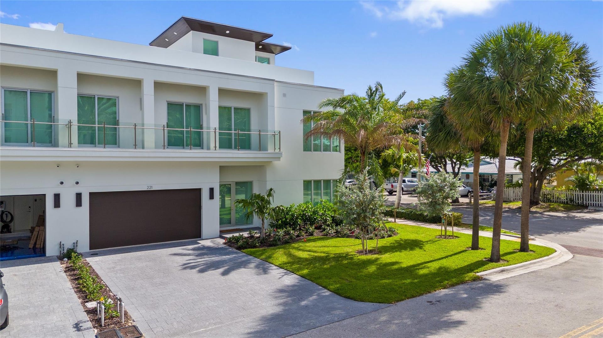 221 Shore Court, Lauderdale By The Sea, FL 33308 Front View - A remarkable luxury townhome rental that redefines upscale living in the heart of Lauderdale By The Sea. This beautifully designed 3,027 sq. ft residence features 4 spacious beds & 4.5 baths, making it perfect for families or those who love to entertain.The home also offers an outdoor kitchen and BBQ area, along with a private plunge pool that invites relaxation and fun. For boating enthusiasts, a boat slip is also available for rent. Easy access to a plethora of amenities, beach, dining, & entertainment.