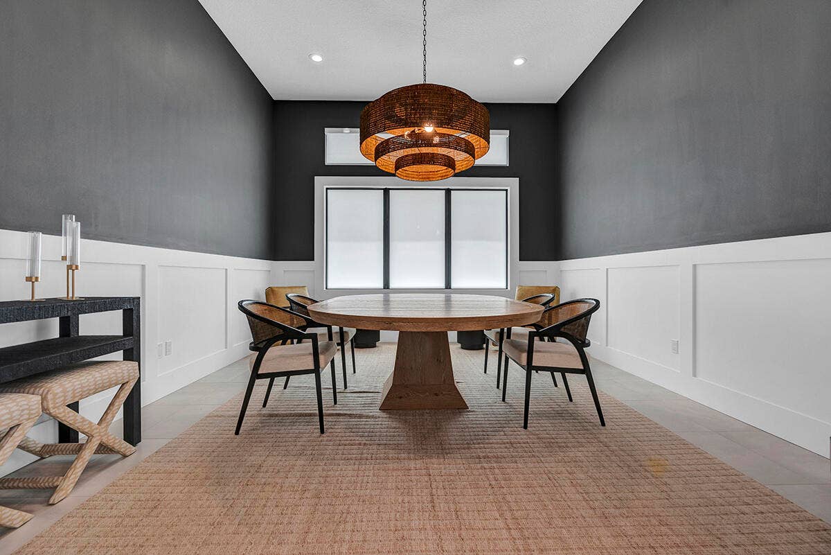 9046 CHAUVET Way, Boca Raton, FL 33496 Dining area featuring a contemporary woven pendant light fixture