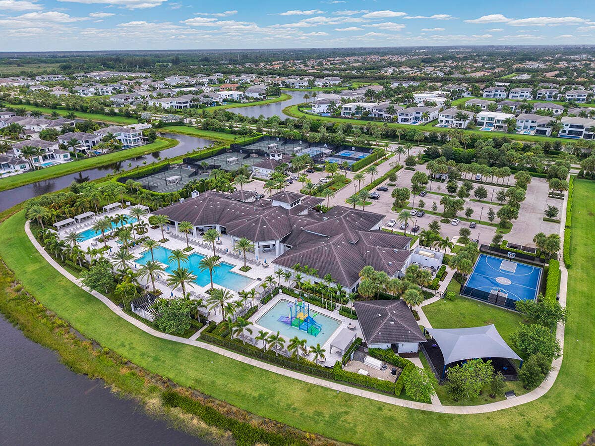 9046 CHAUVET Way, Boca Raton, FL 33496 Extensive community amenities featuring multiple swimming pools, sports courts, a playground, and lush landscaping