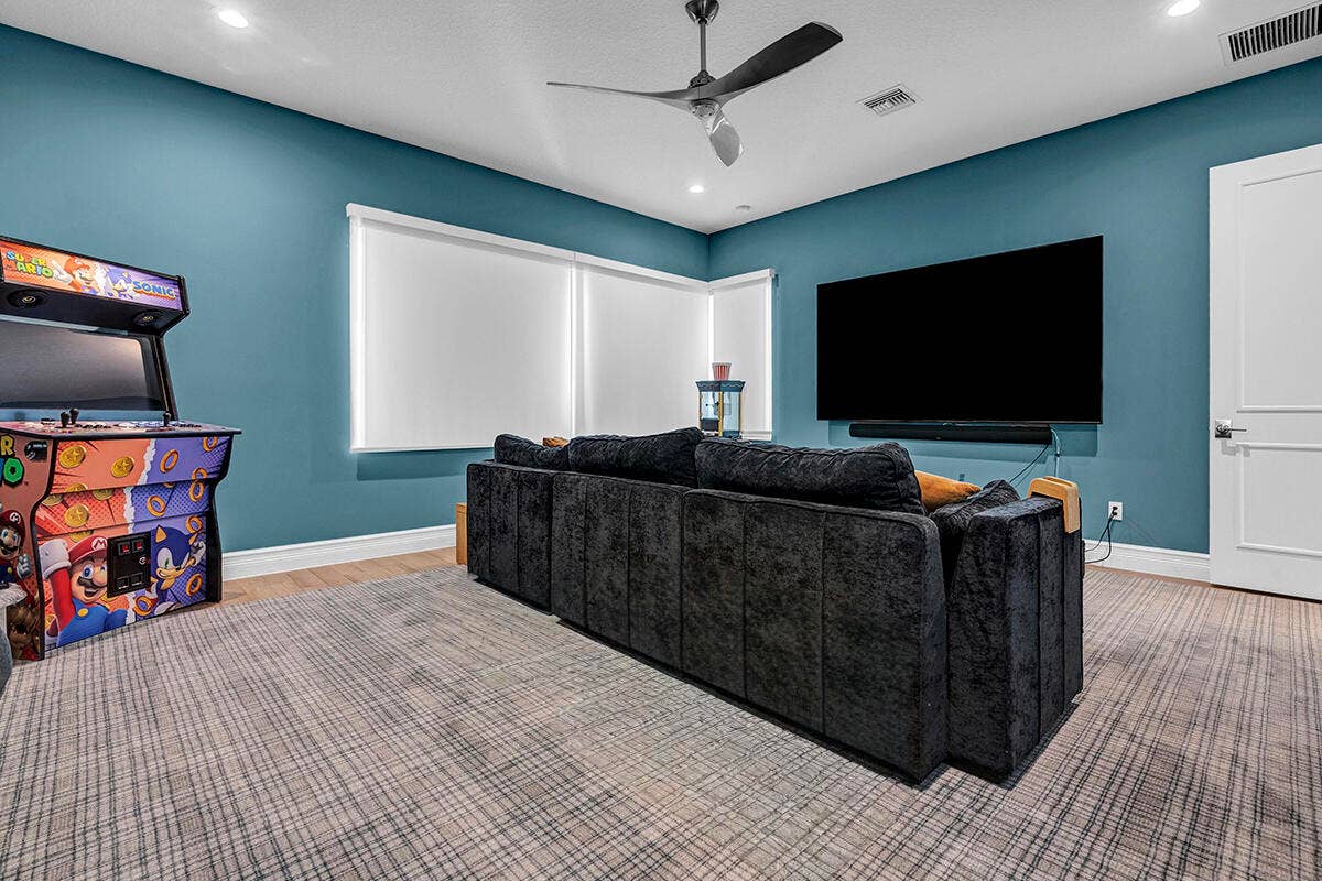 9046 CHAUVET Way, Boca Raton, FL 33496 Room featuring blue accent walls, recessed lighting, and a modern ceiling fan