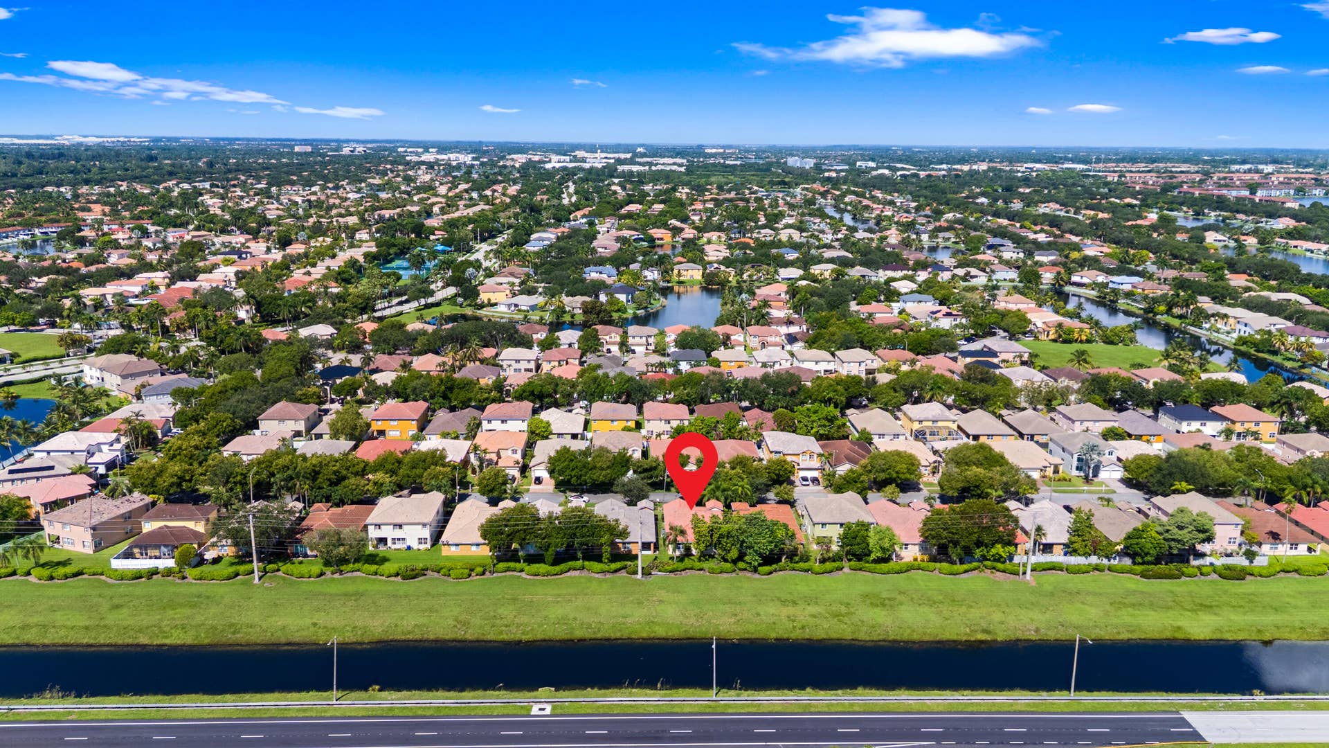 2311 SW 125th Avenue, Miramar, FL 33027 Enjoy Added Privacy with a Berm and Canal Behind the Home
