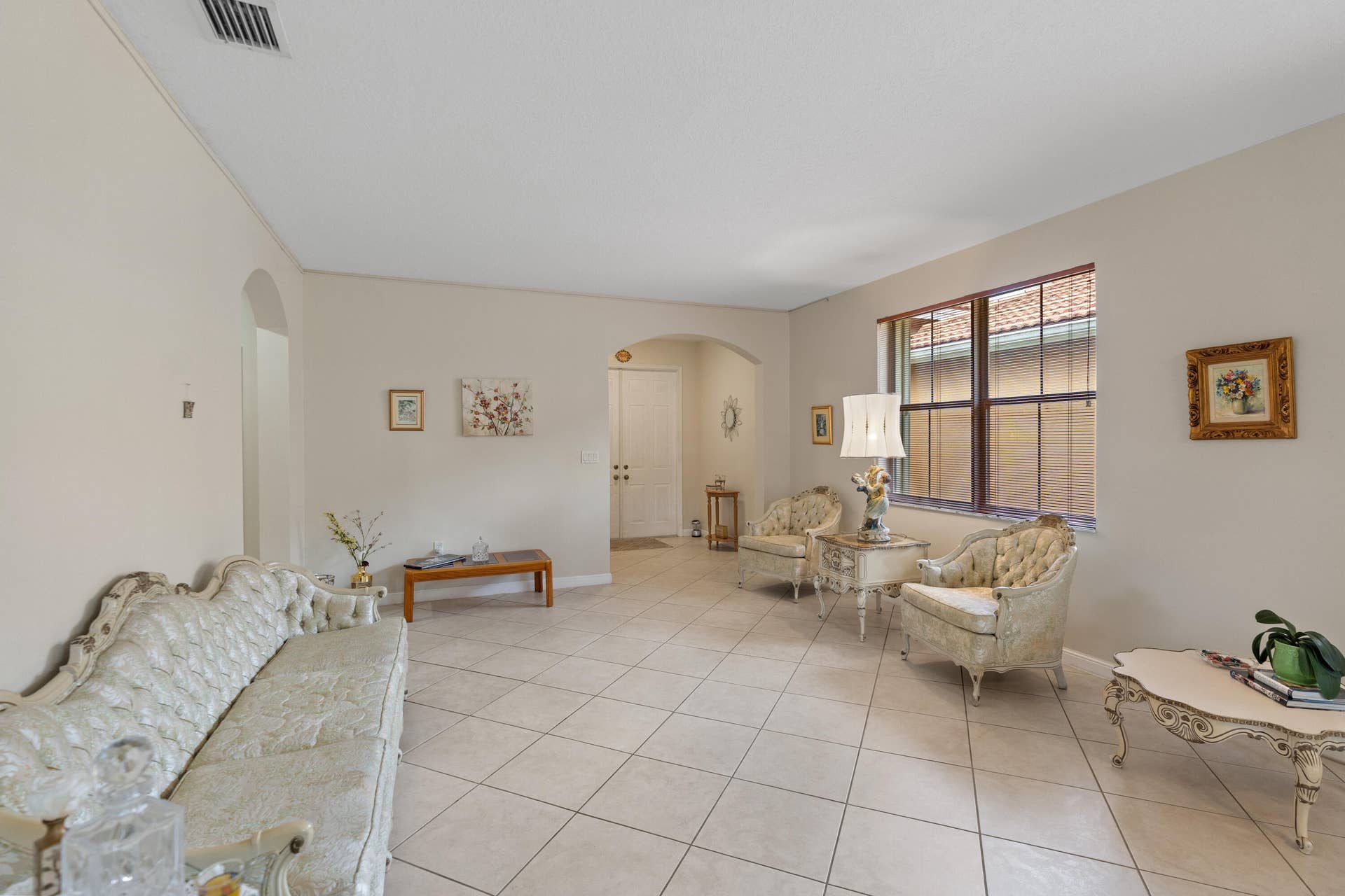 2311 SW 125th Avenue, Miramar, FL 33027 Formal living & dining with an open, airy feel. The home has high ceilings, tile floors and spacious rooms through the home.