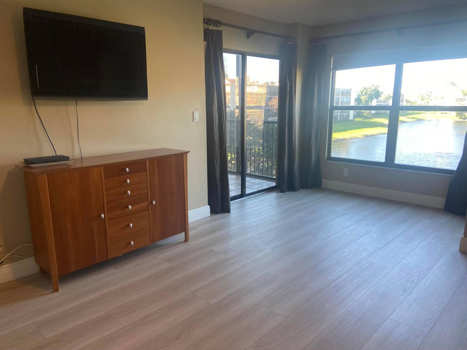 14460 Strathmore Lane, #306, Delray Beach, FL 33446 sliding doors to lanai from primary bedroom