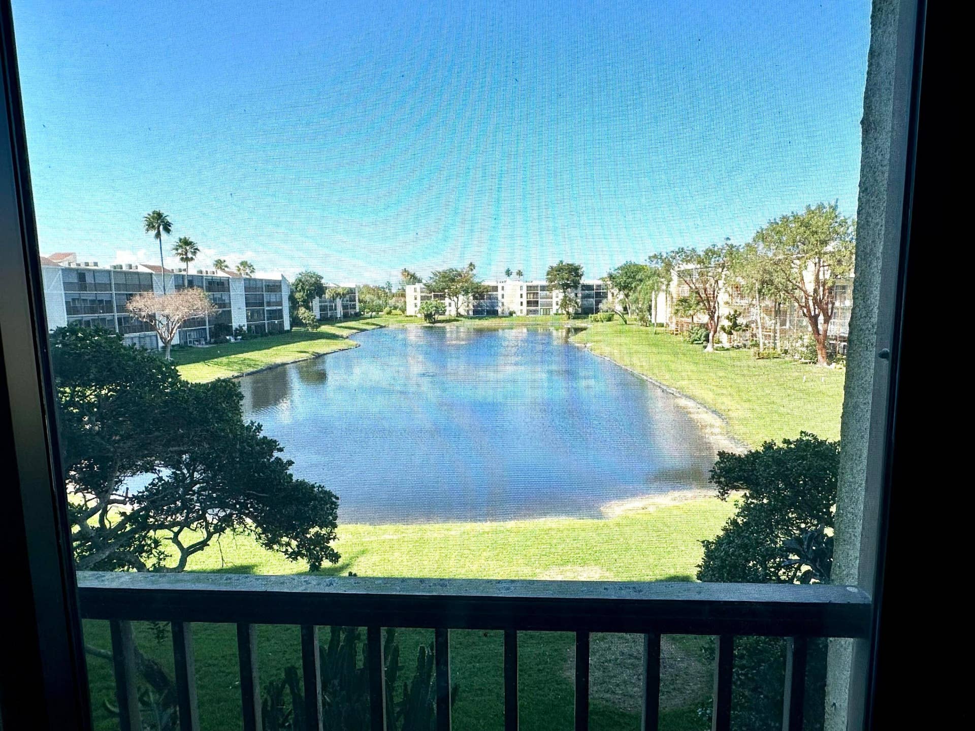 14460 Strathmore Lane, #306, Delray Beach, FL 33446 Long lake view from lanai