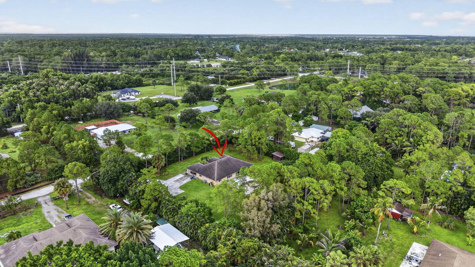 15664 89TH Place N, The Acreage, FL 33470 64-web-or-mls-DJI_20260918113345_0272_D