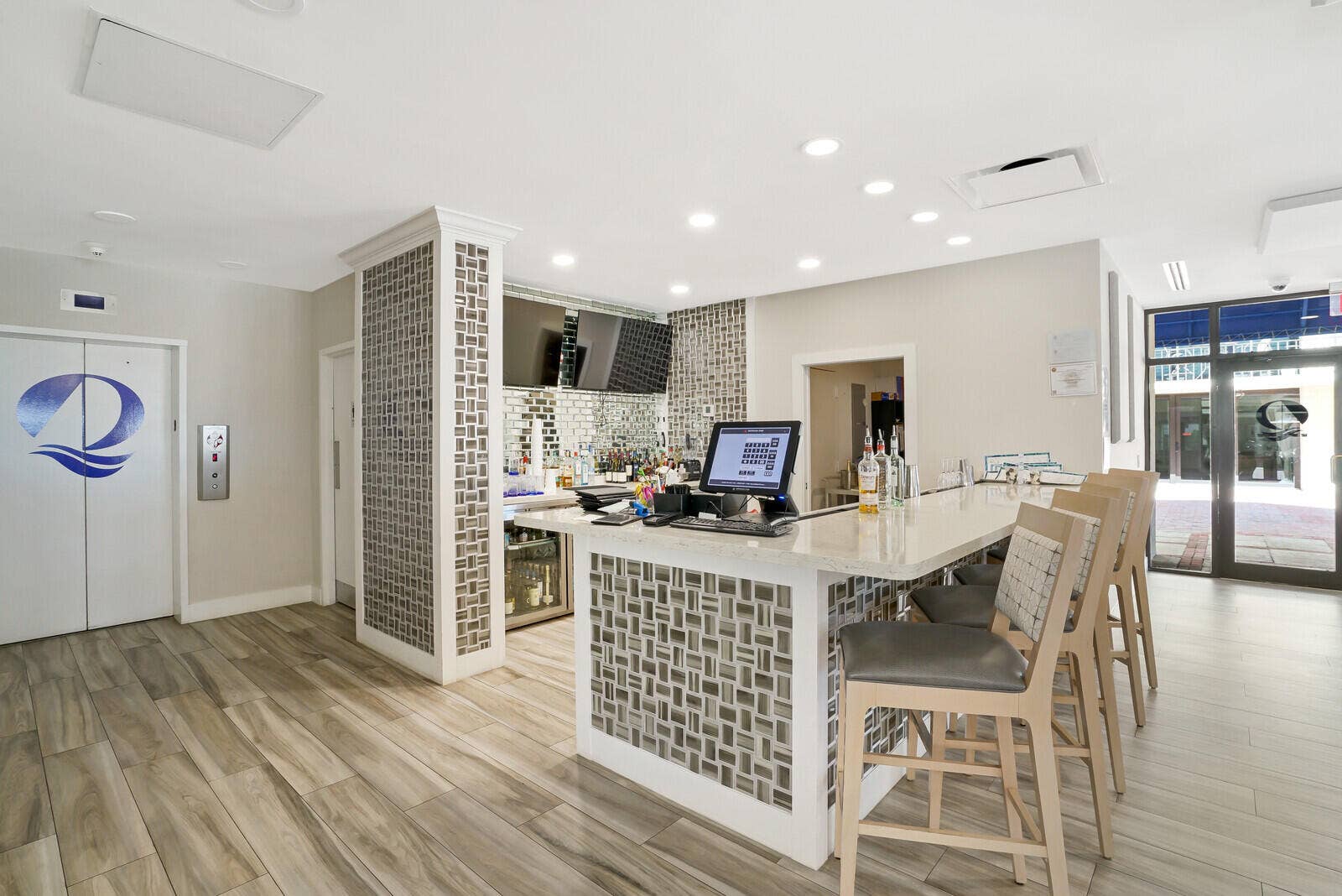 The Q's resident bar offers another inviting place for drinks, dinner and socializing without leaving the community.