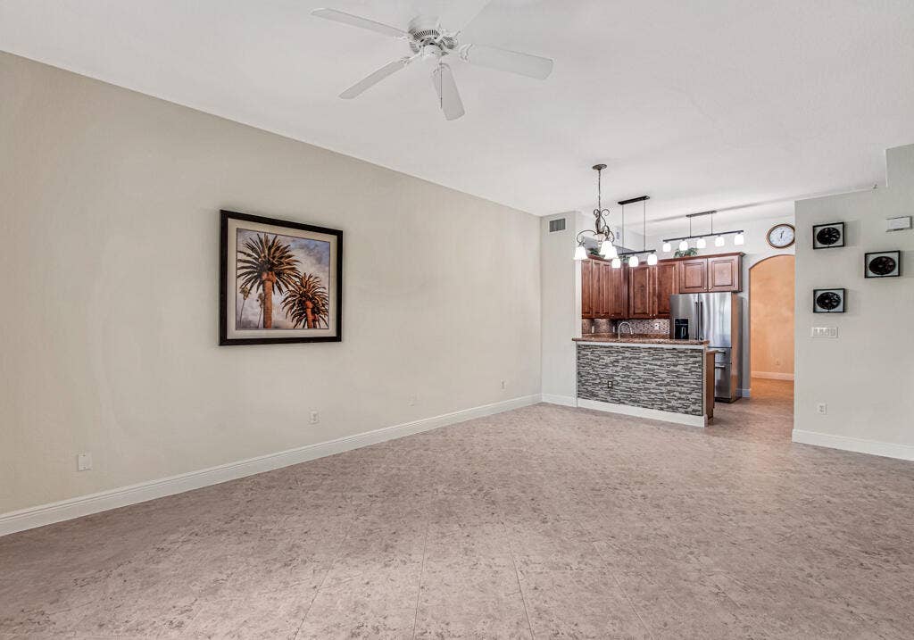 9777 BOWLINE Drive, #102, West Palm Beach, FL 33411 Family room, kitchen