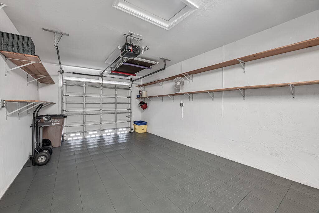 9777 BOWLINE Drive, #102, West Palm Beach, FL 33411 Nice garage floor tile
