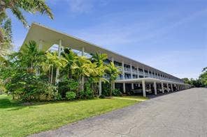 777 SE 2ND Avenue, #213, Deerfield Beach, FL 33441 BUILDING EXTERIOR WITH COVERED PARKING