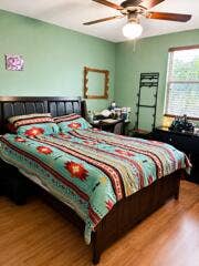 18431 NW 18TH Street, Pembroke Pines, FL 33029 Wood-finish flooring with a ceiling fan light fixture